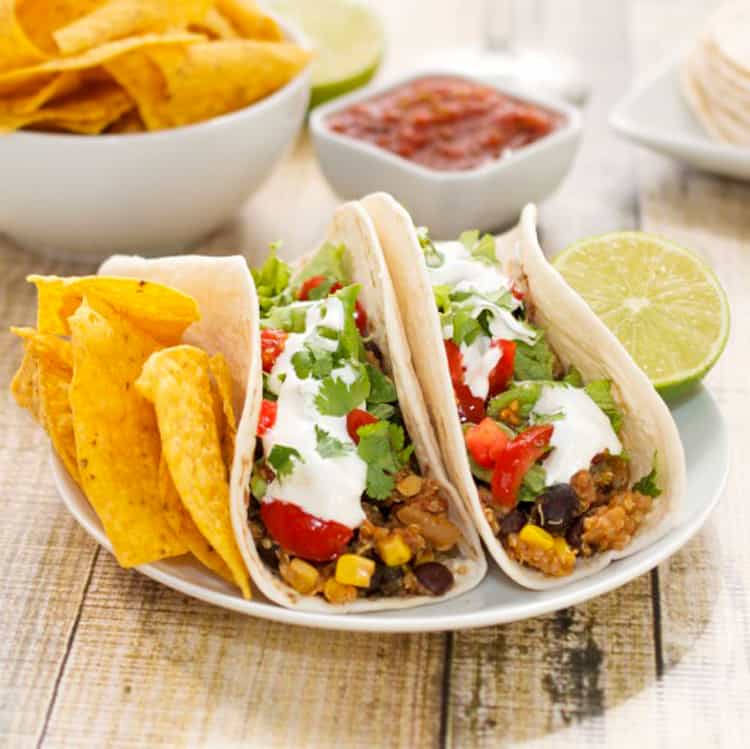 Plate with 2 black bean tacos