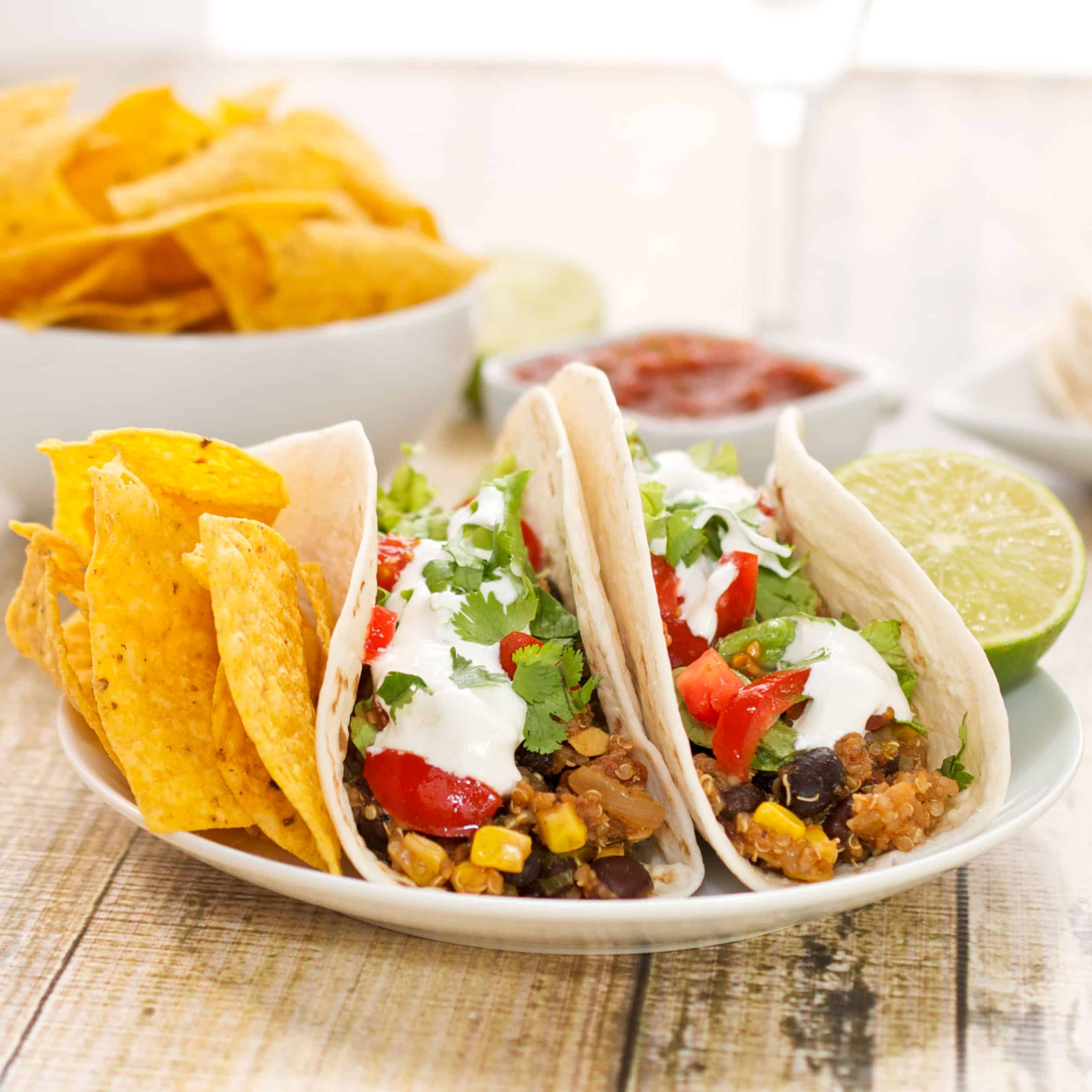 black bean tacos on plate with lime