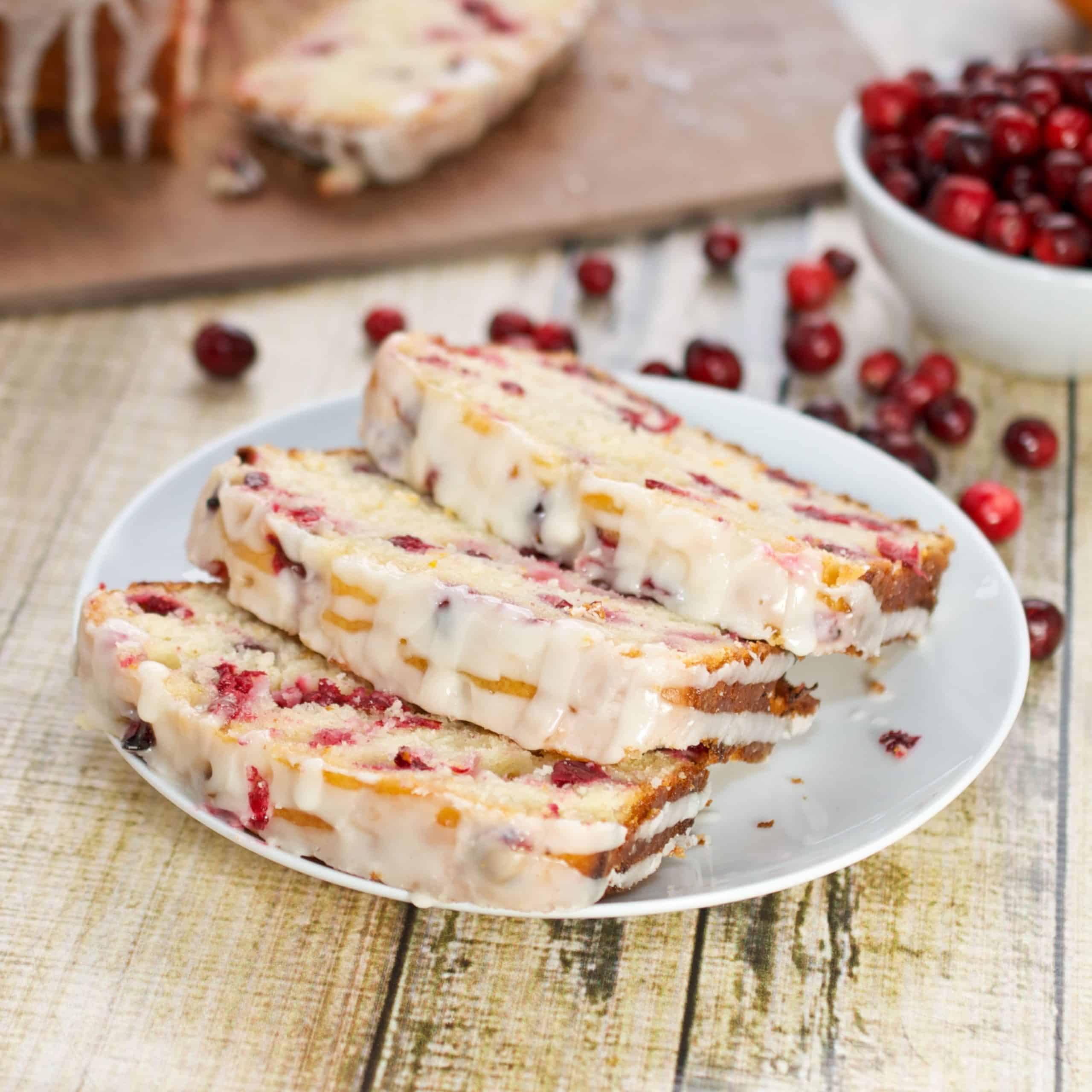 slices of Cranberry Orange Bread on a white plate