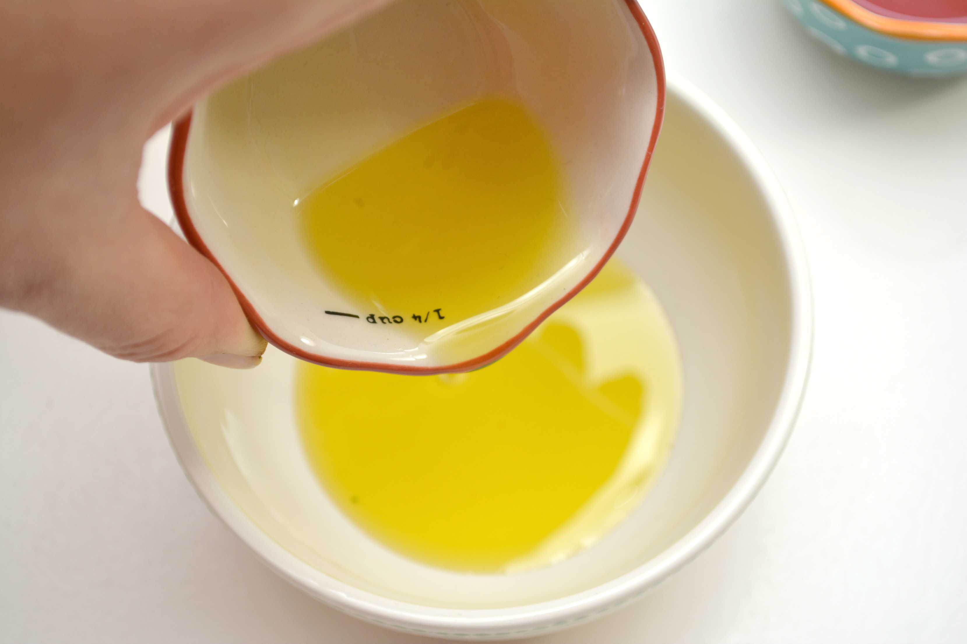 pouring ingredients into bowl