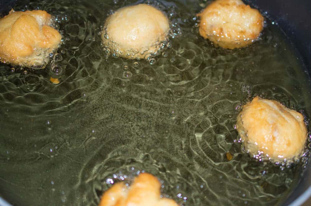 Nutella Dumplings being fried in grease. 