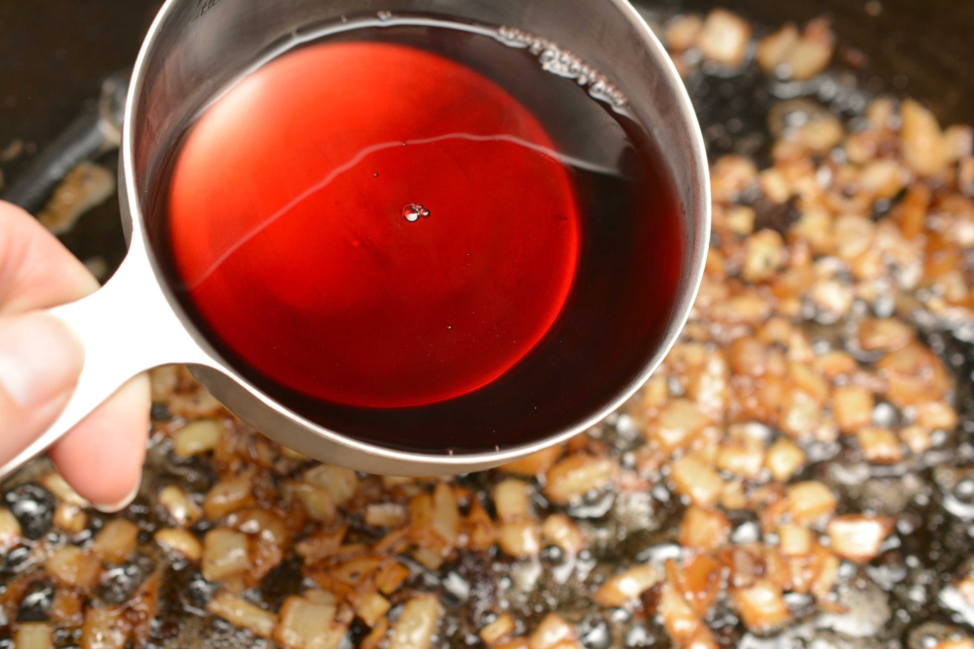 red wine in measuring cup