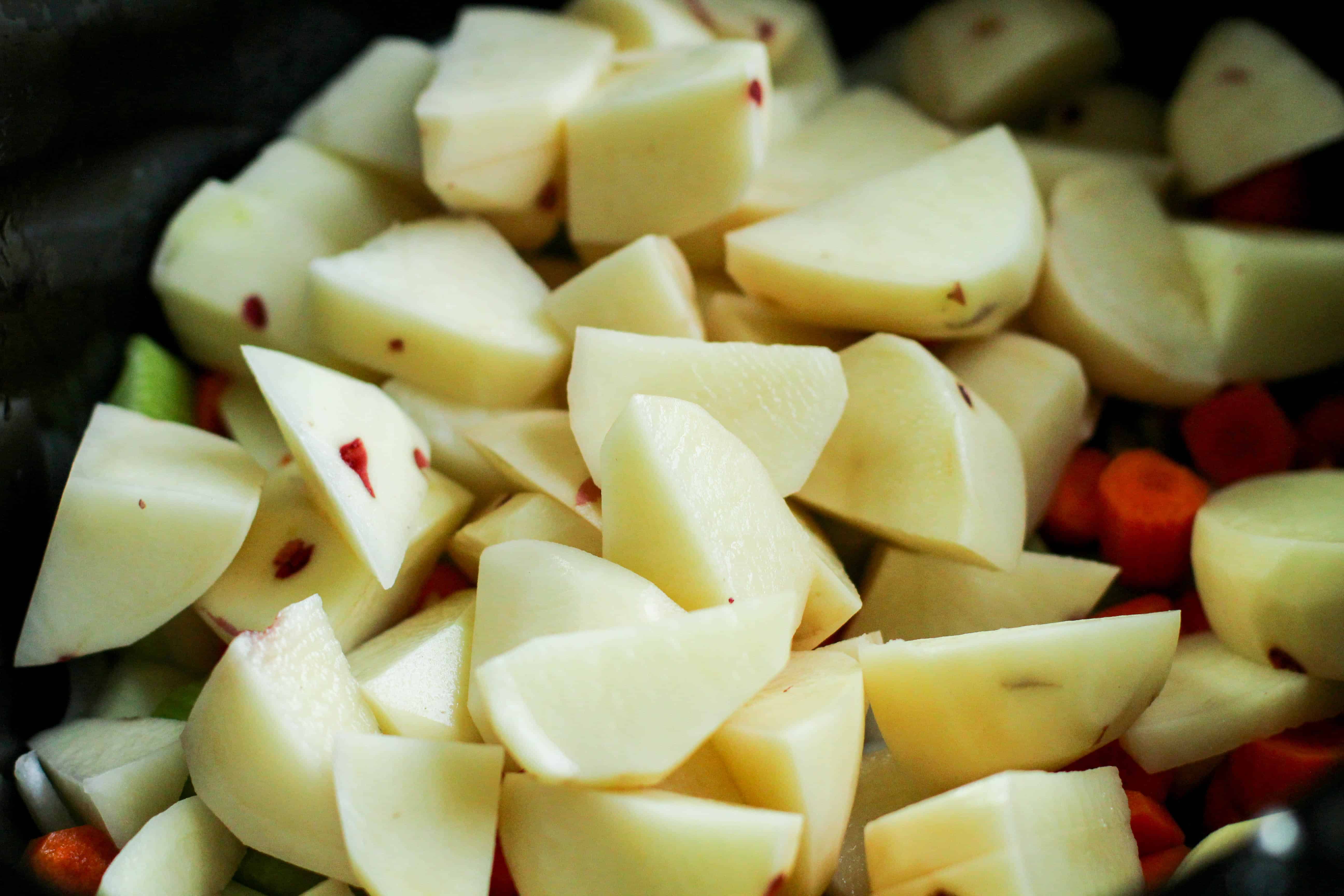 peeled potatoes in a bowl