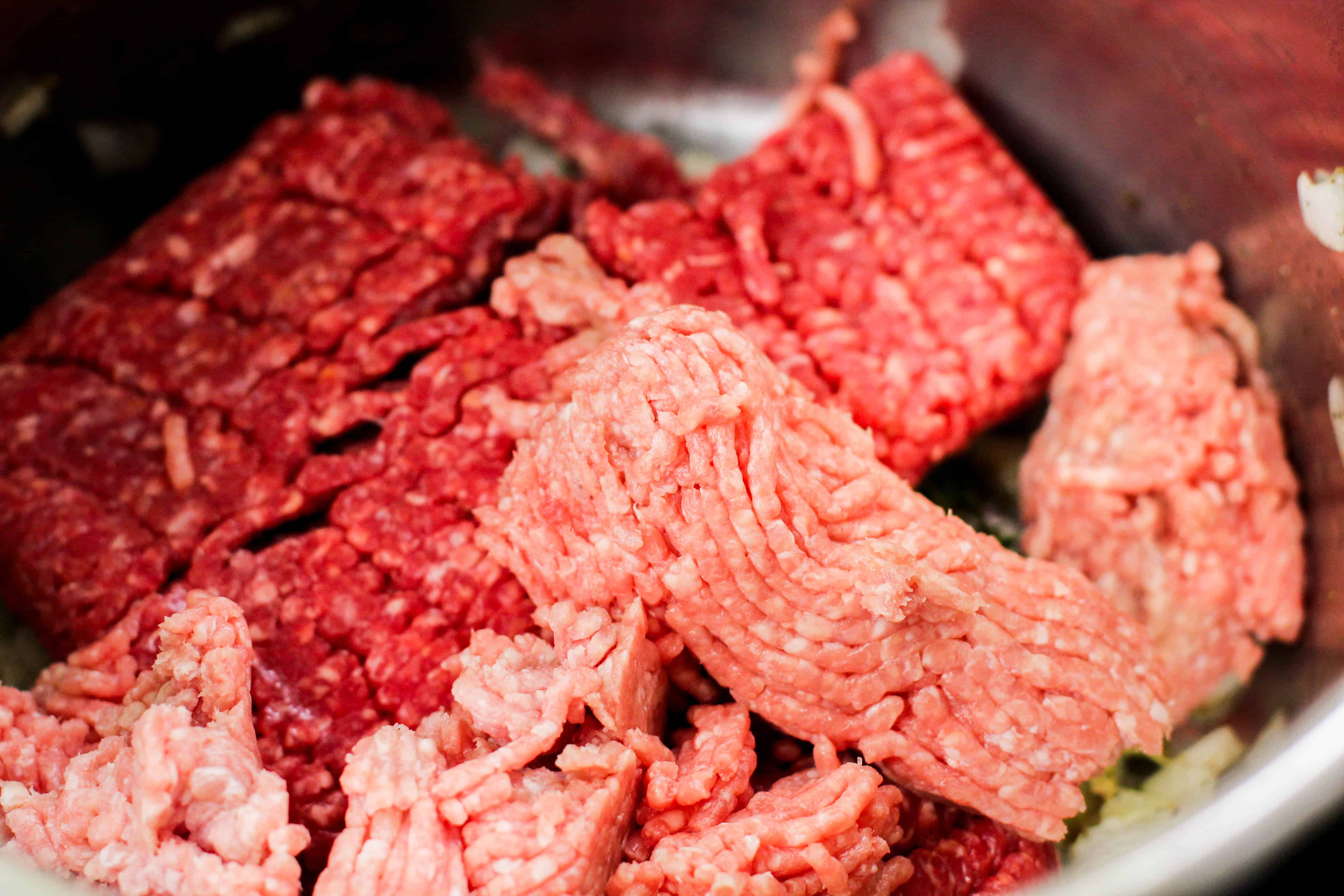 ground beef and ground pork in a pot