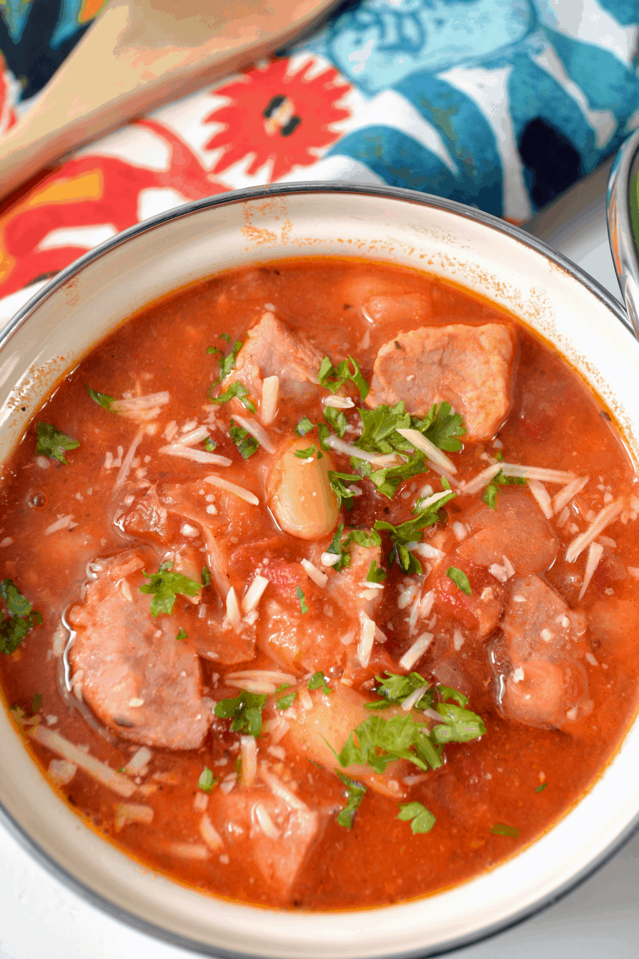 An overhead picture of a bowl of instant pot sausage and bean soup