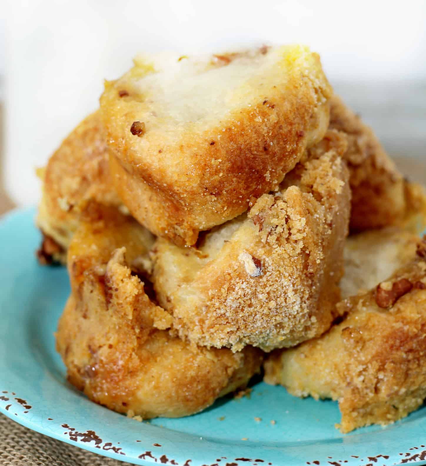 Brown Sugar Pecan Rolls Bread on a blue plate 