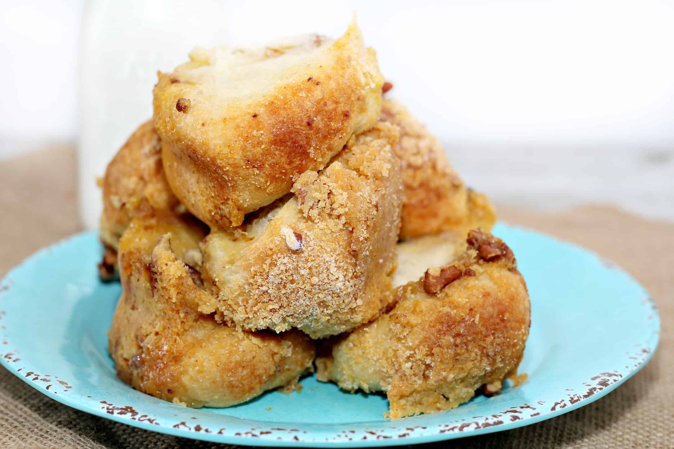 Brown Sugar Pecan Rolls Bread on a blue plate 