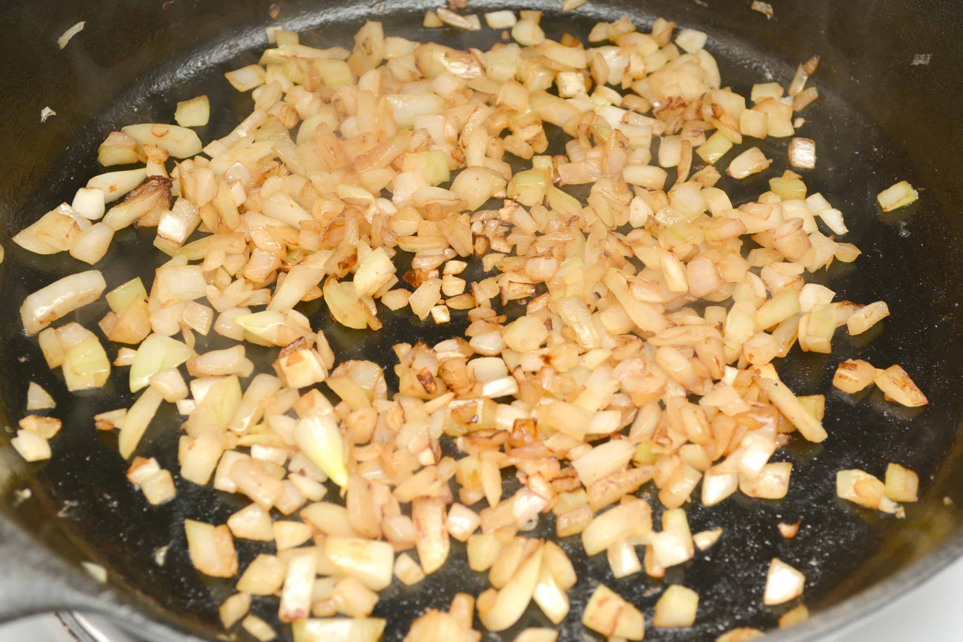 cooking fried rice in skillet