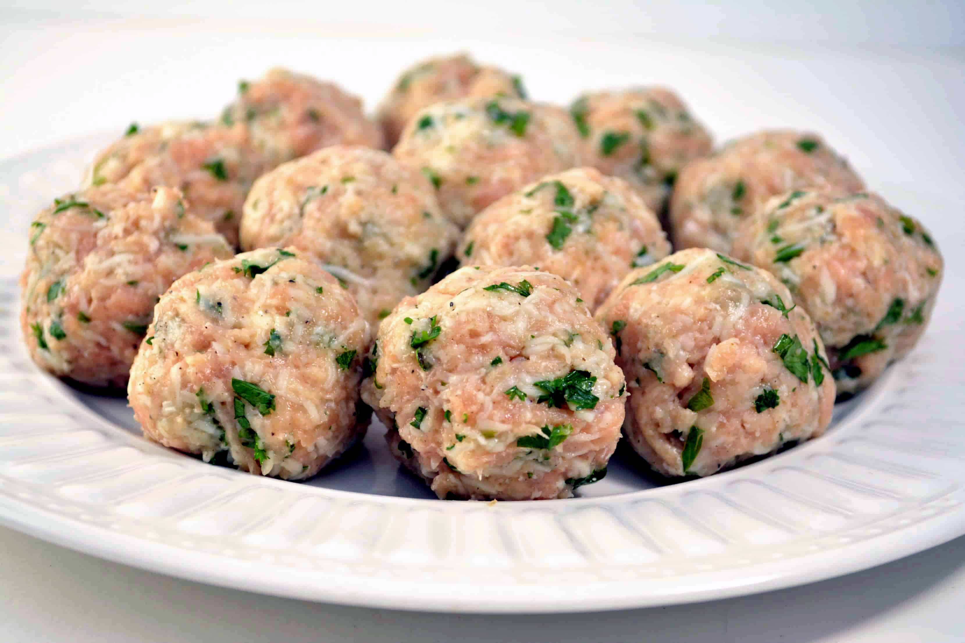 raw turkey meatballs on plate