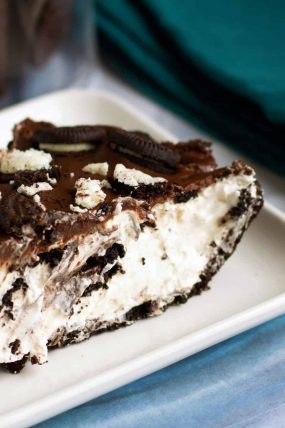 slice of no bake oreo pie with cookies on top