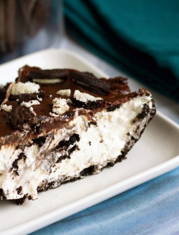 slice of no bake oreo pie with cookies on top