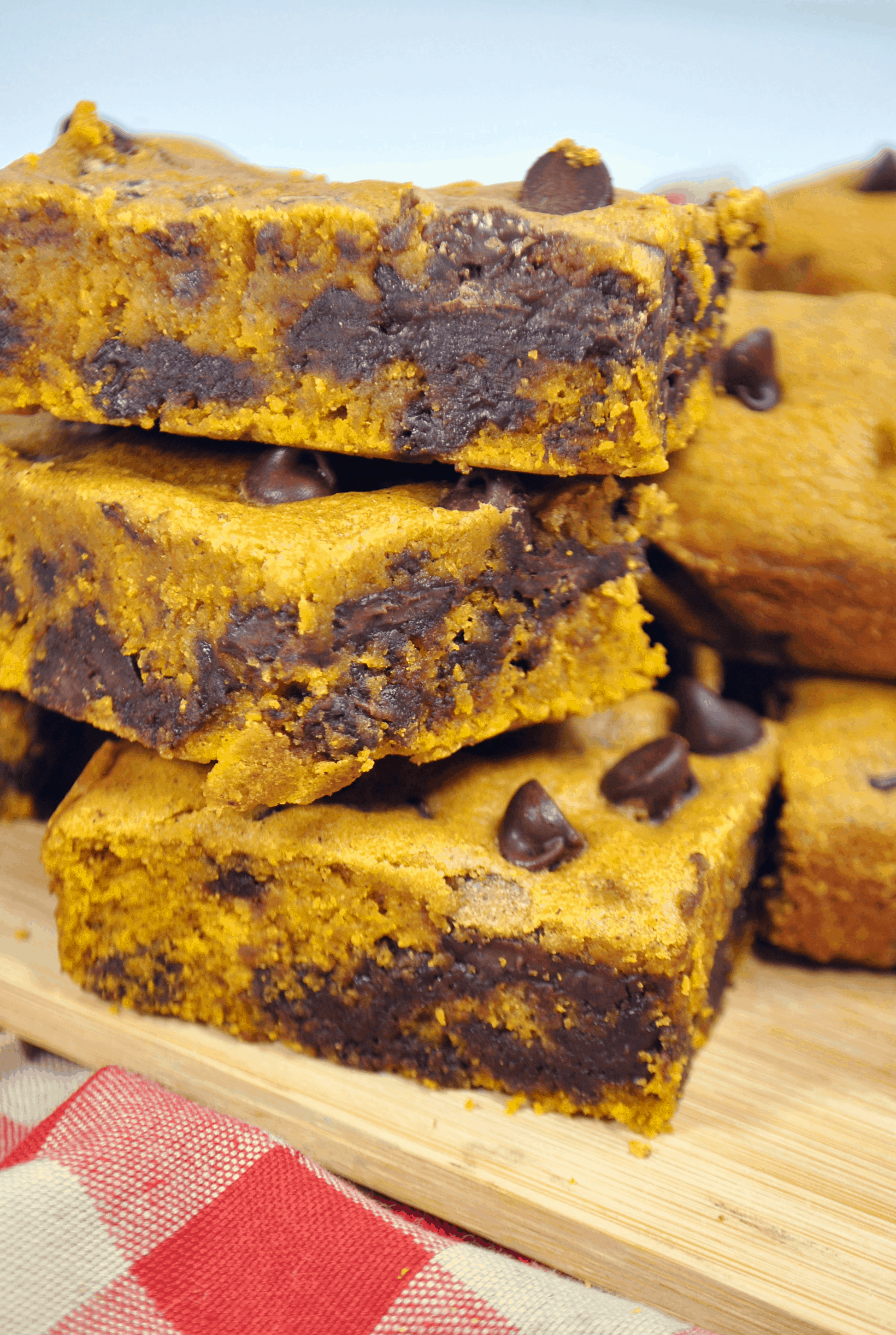 stacked chocolate chip pumpkin bars on table