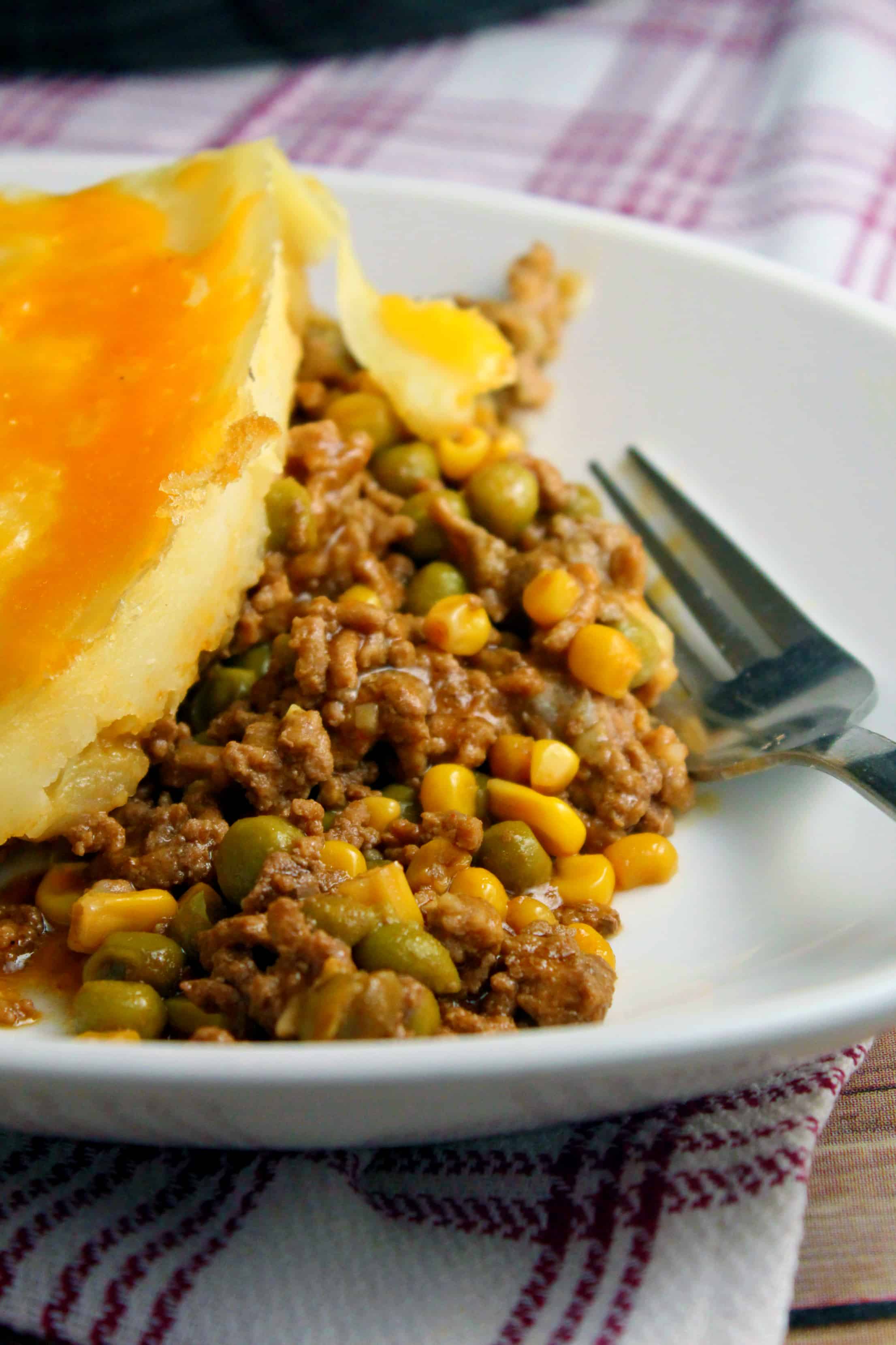 overview of ground beef sheperd pie on a plate