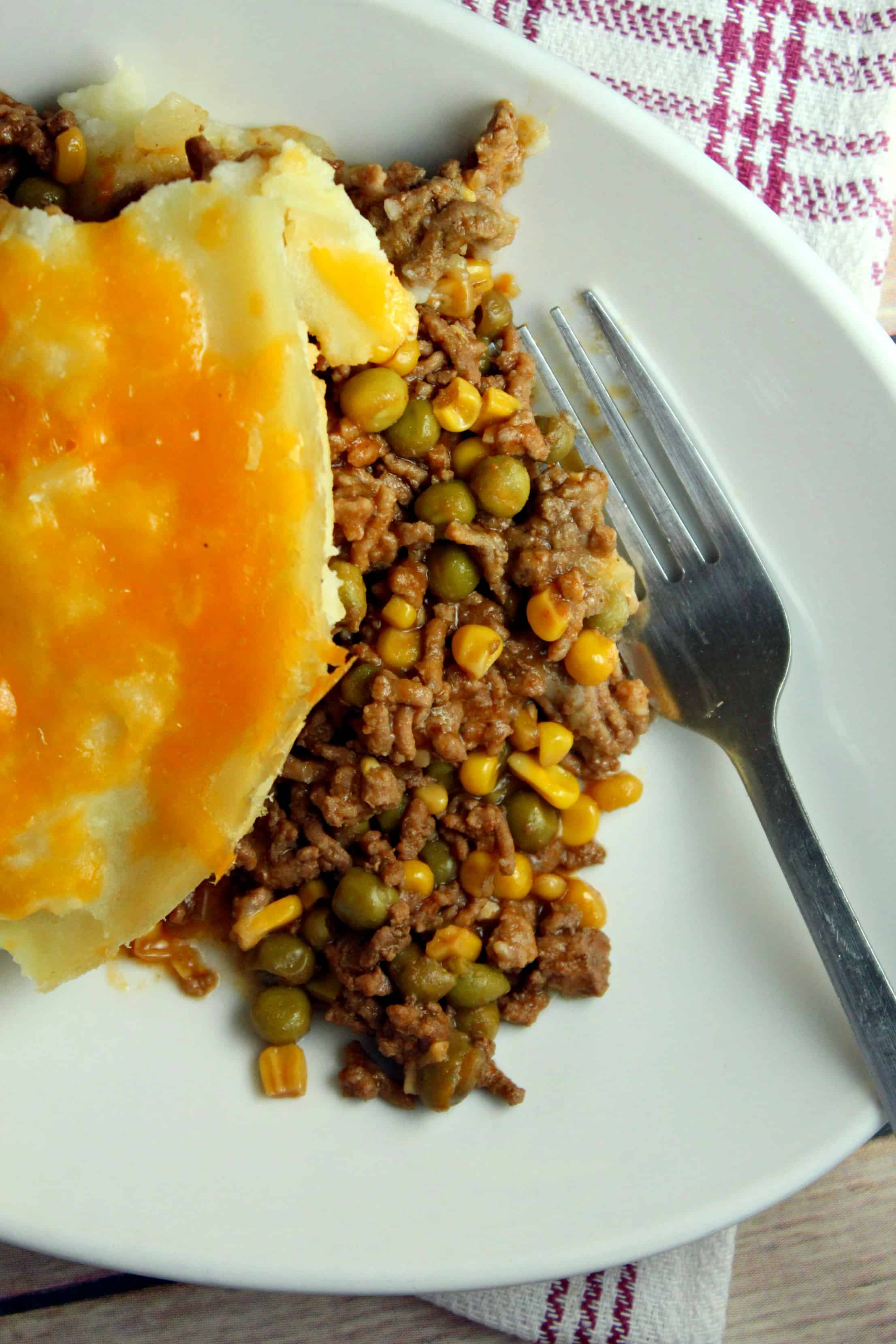 overview of ground beef sheperd pie on a plate