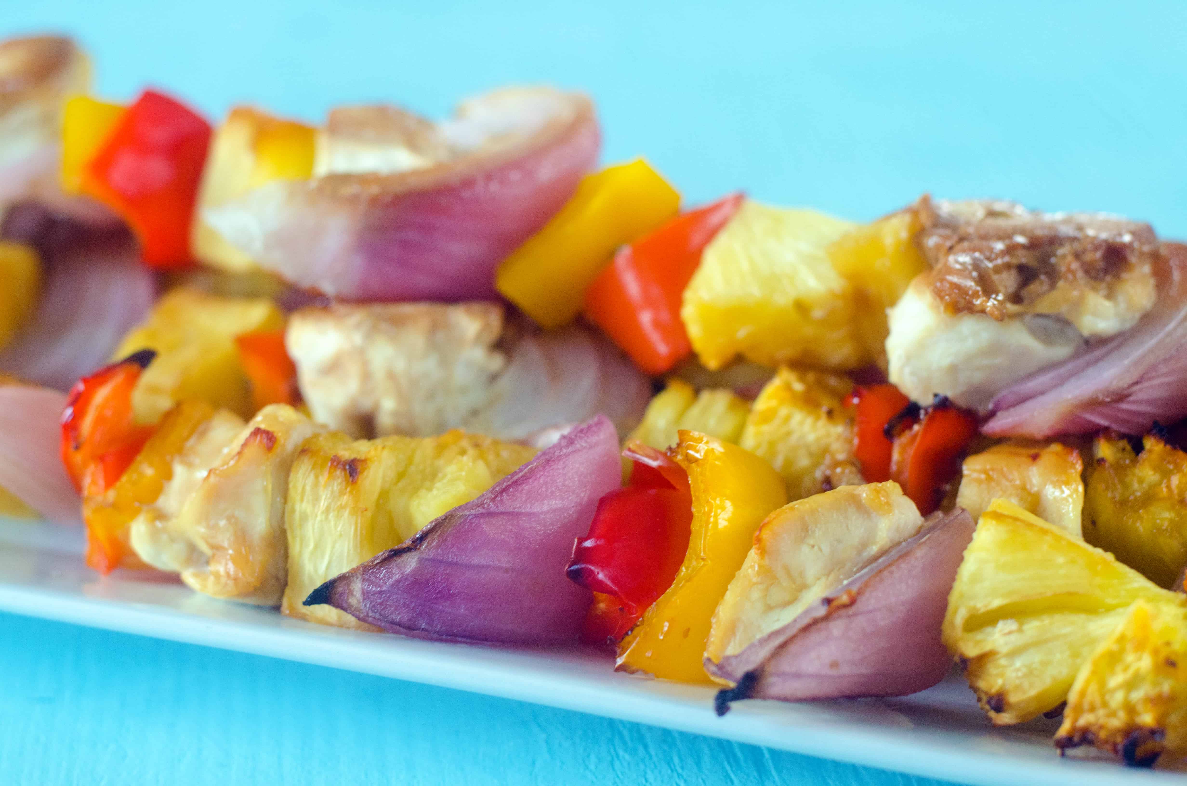 cooked chicken kabobs on a plate