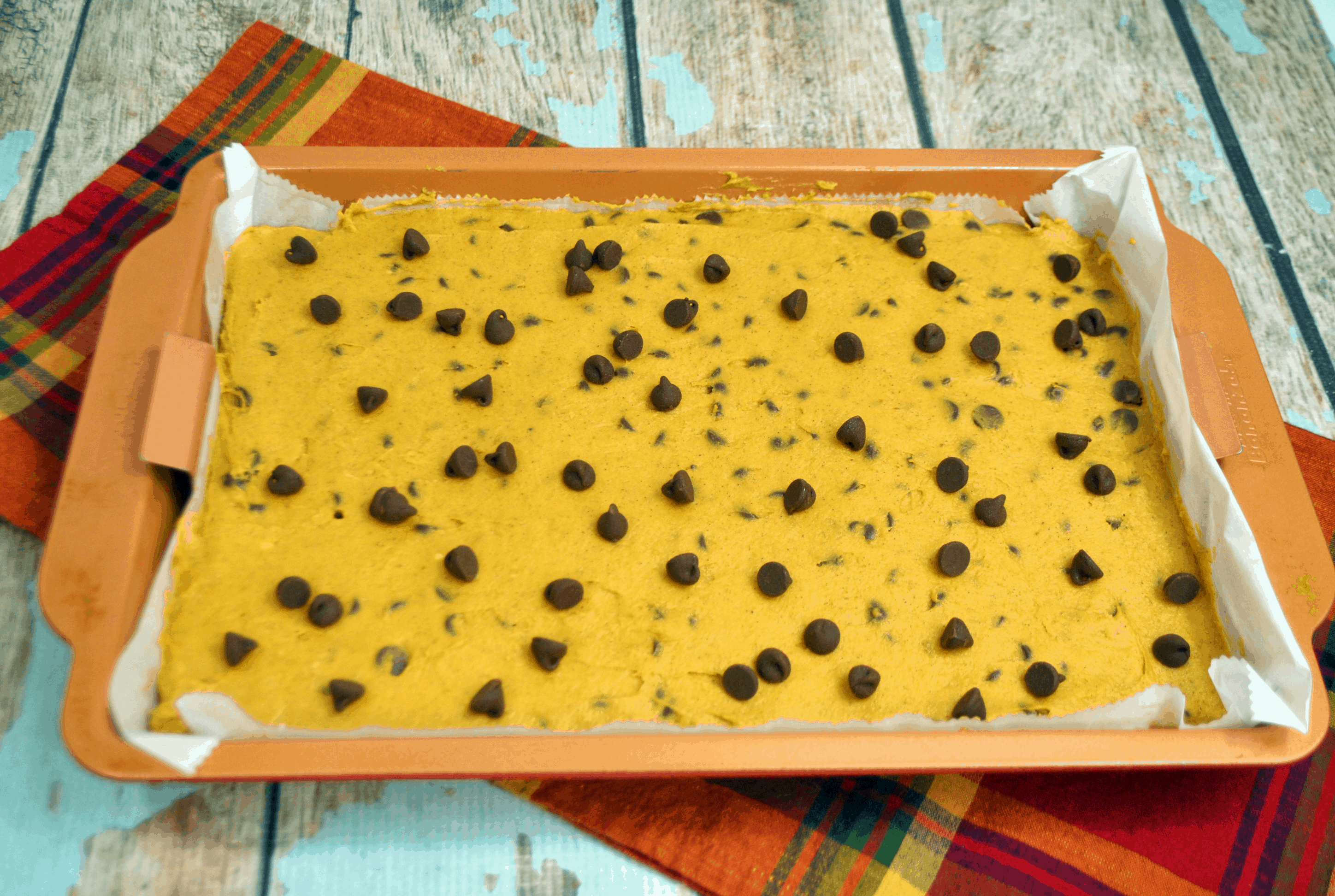 chocolate chip pumpkin bars in pan