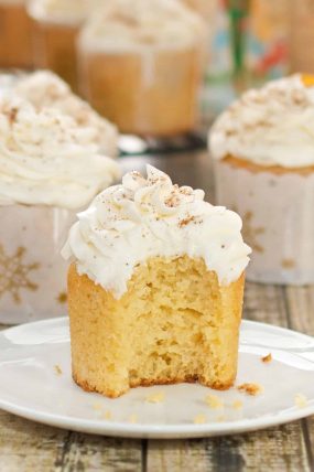 Up close picture of eggnog cupcake topped with rum infused frosting