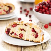 bowl with fresh cranberries and cooked cranberry orange scones
