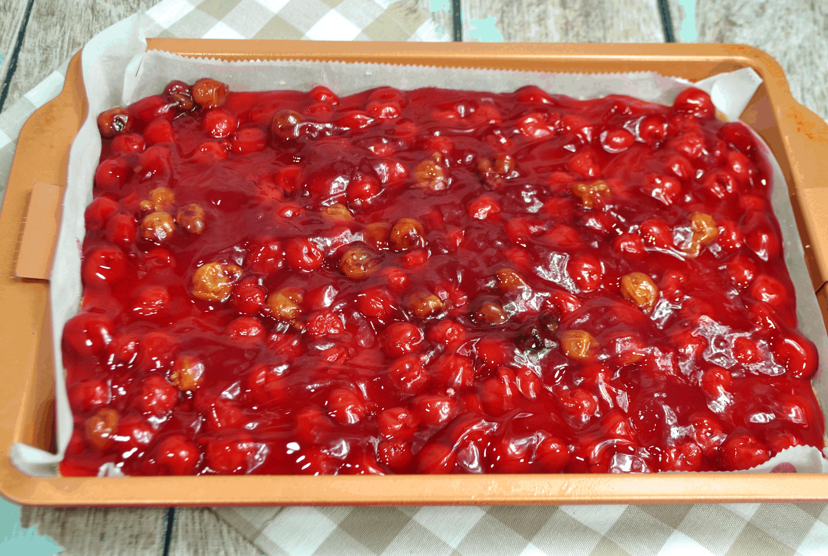 add cherry pie filling on top of crust in a casserole pan