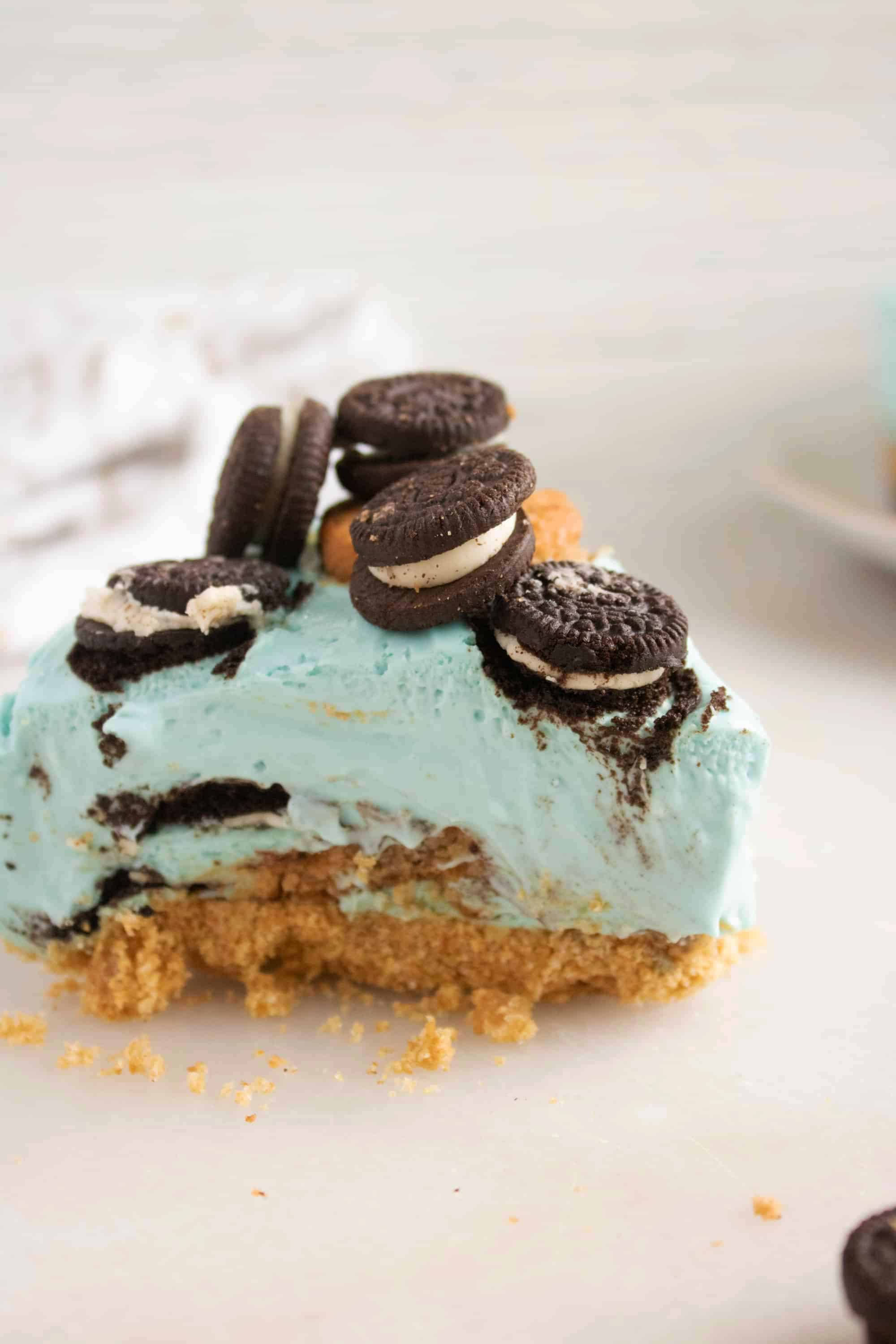 slice of cookie monster cheesecake
