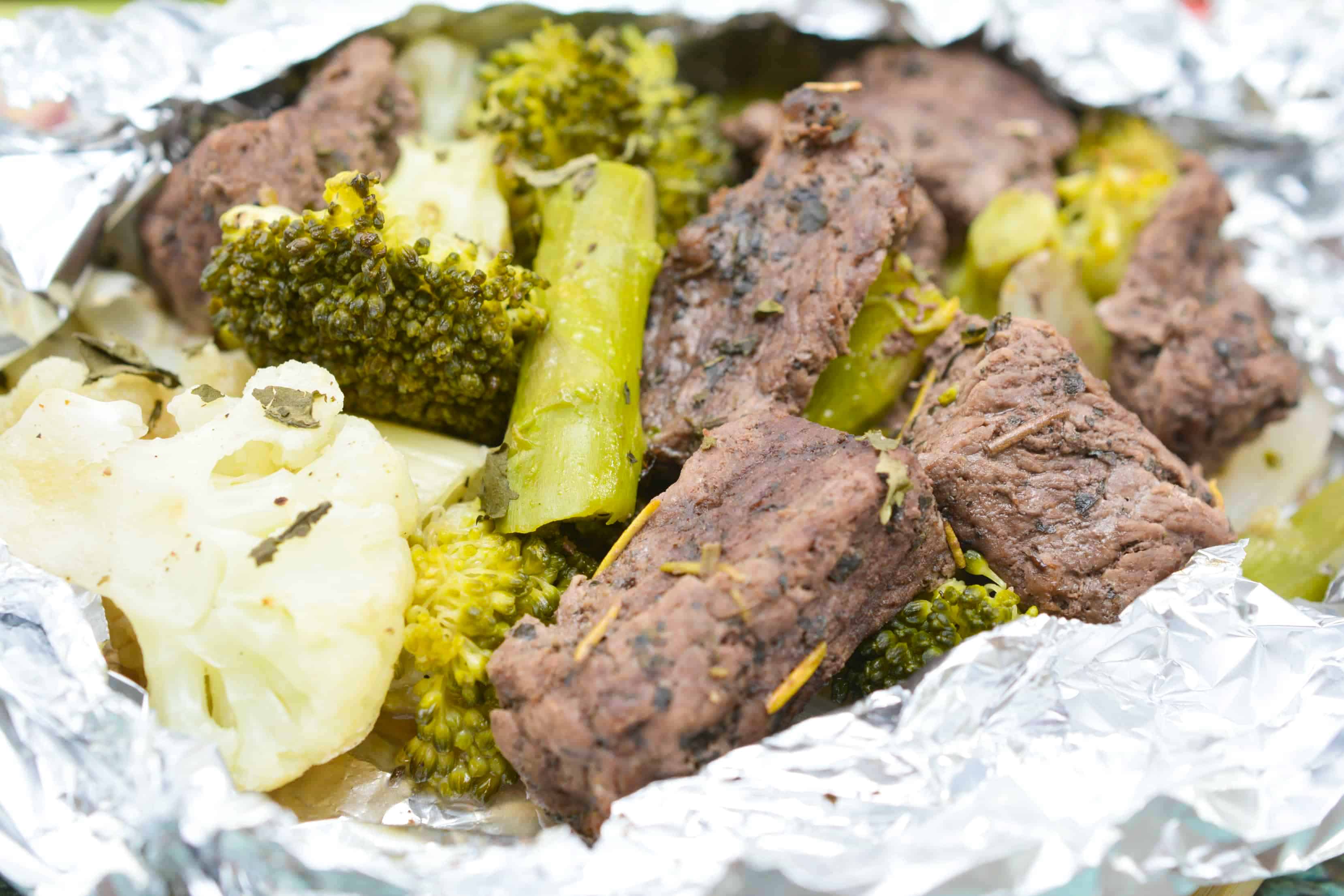 steak and vegetables in a foil packet