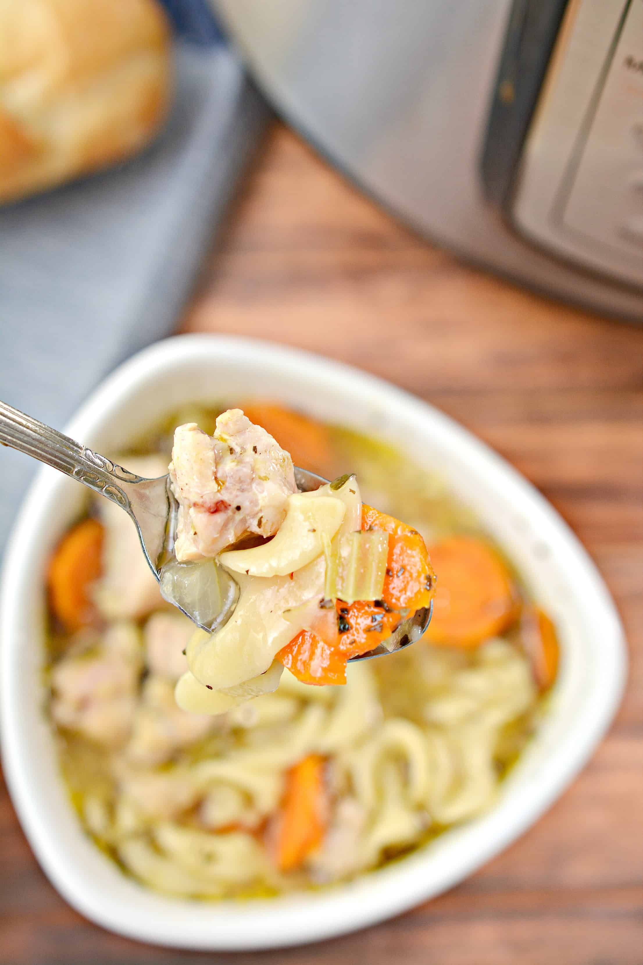 chicken noodle soup on a spoon