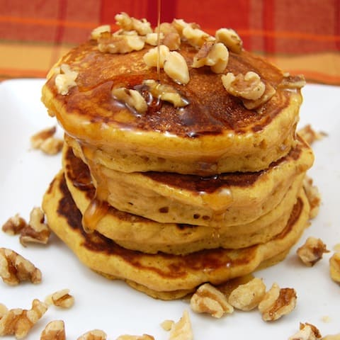 pumpkin pancakes with nuts and syrup