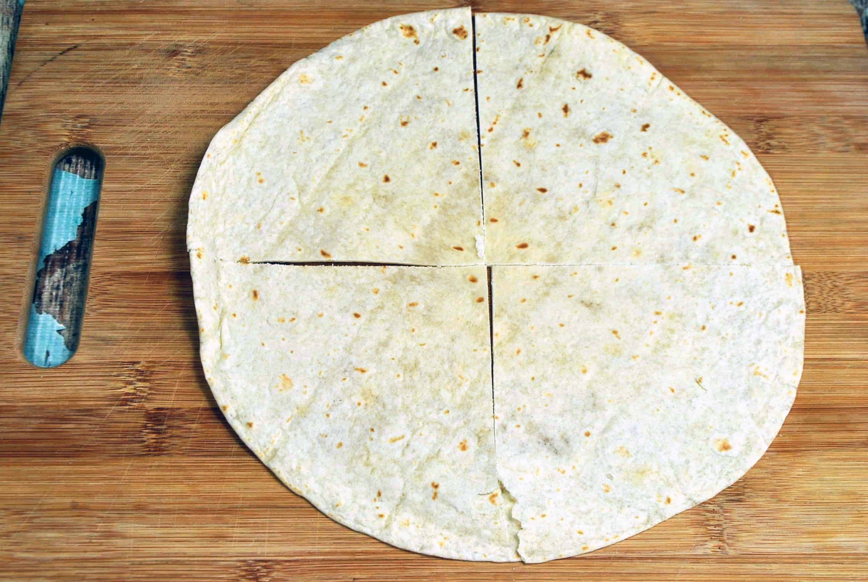 cut the tortilla into 4 pieces