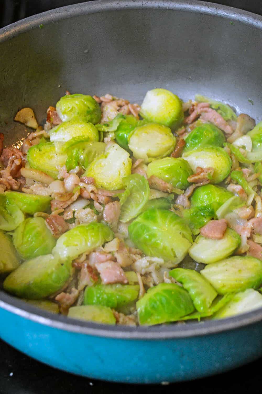 bacon and bussel sprouts in a frying pan