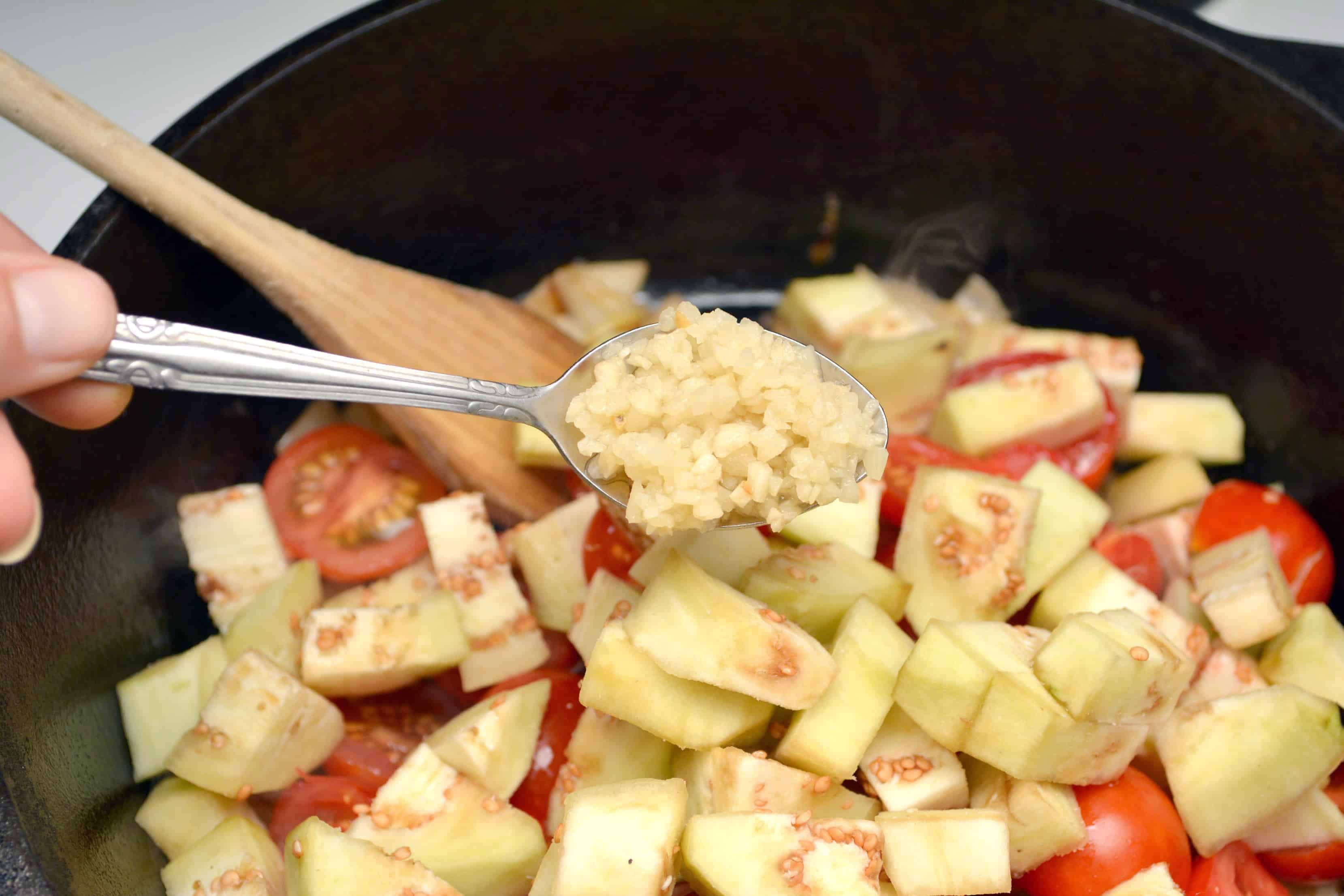 Add garlic to vegetables