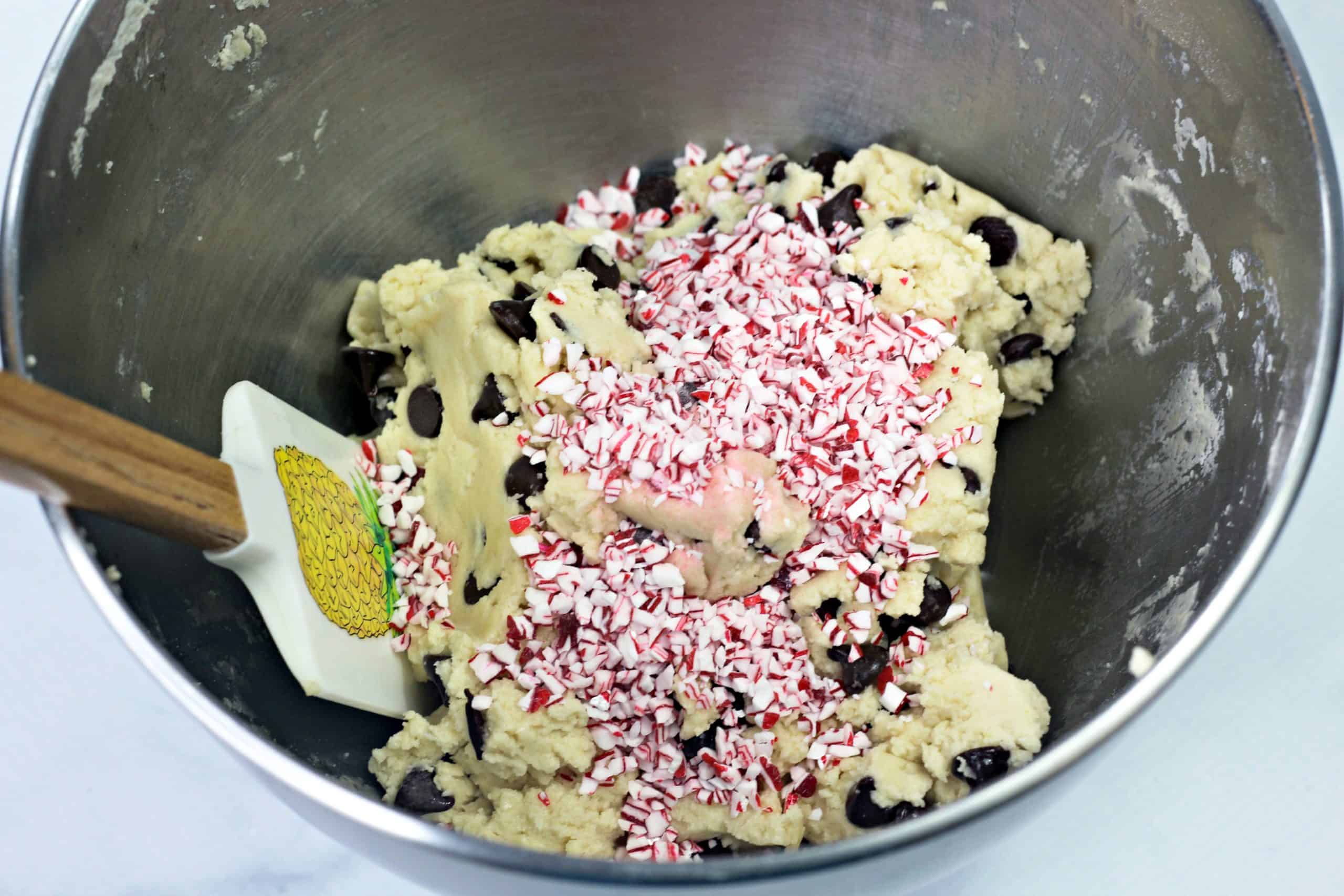 cookie batter with peppermint pieces and chocolate chips