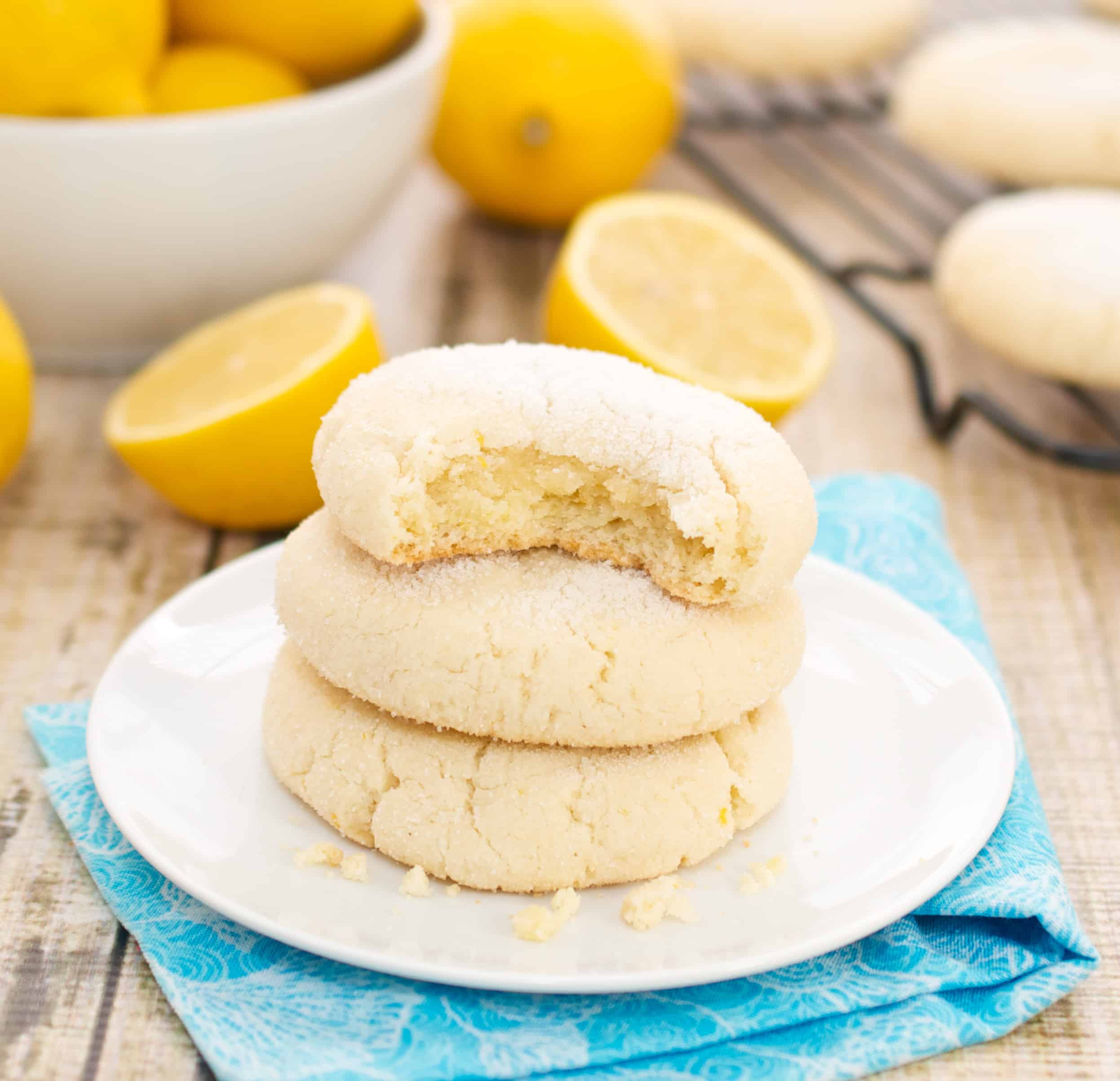 lemon cookies in a stack on a plate
