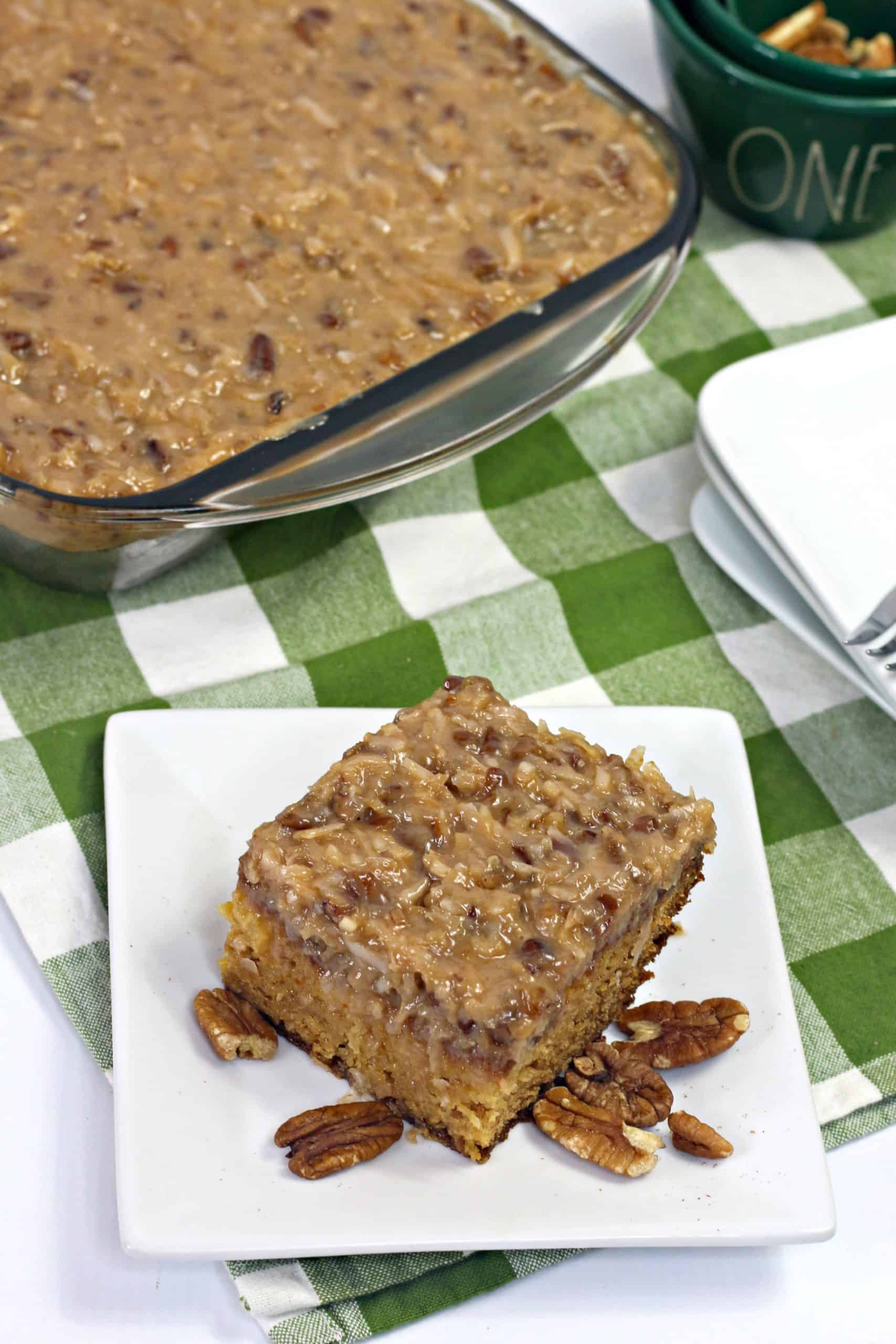 Old Fashioned Cajun Cake Recipe - This cajun cake is so flavorful and EASY to make! This old fashioned cake is complete with crushed pineapple, toasted coconut, and pecans. #cake #cajun #cajuncake #oldfashioned #pineapple #easy #homemade #simple #dessert #sweetpeaskitchen