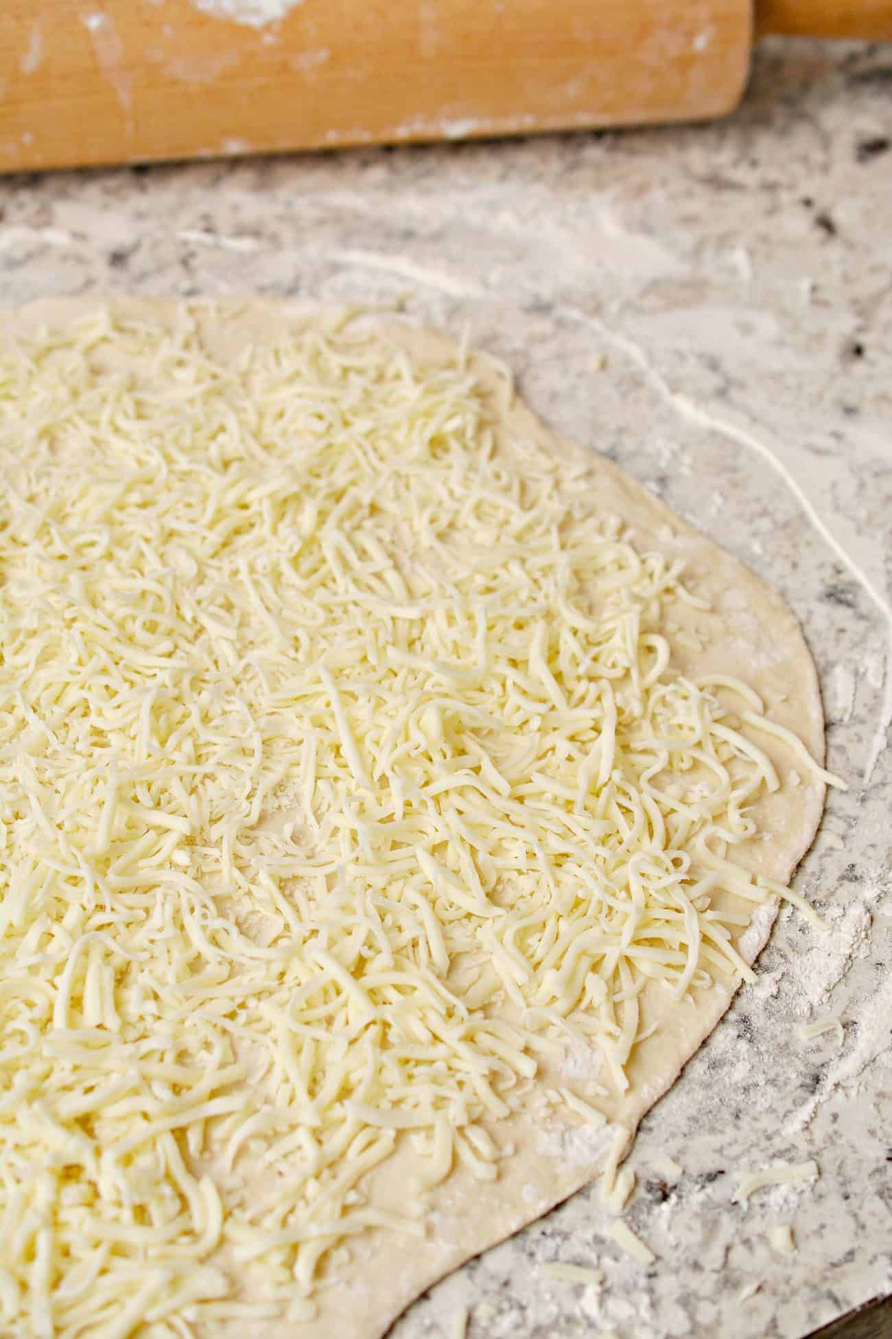 Layer the mozzarella along the top of the dough.
