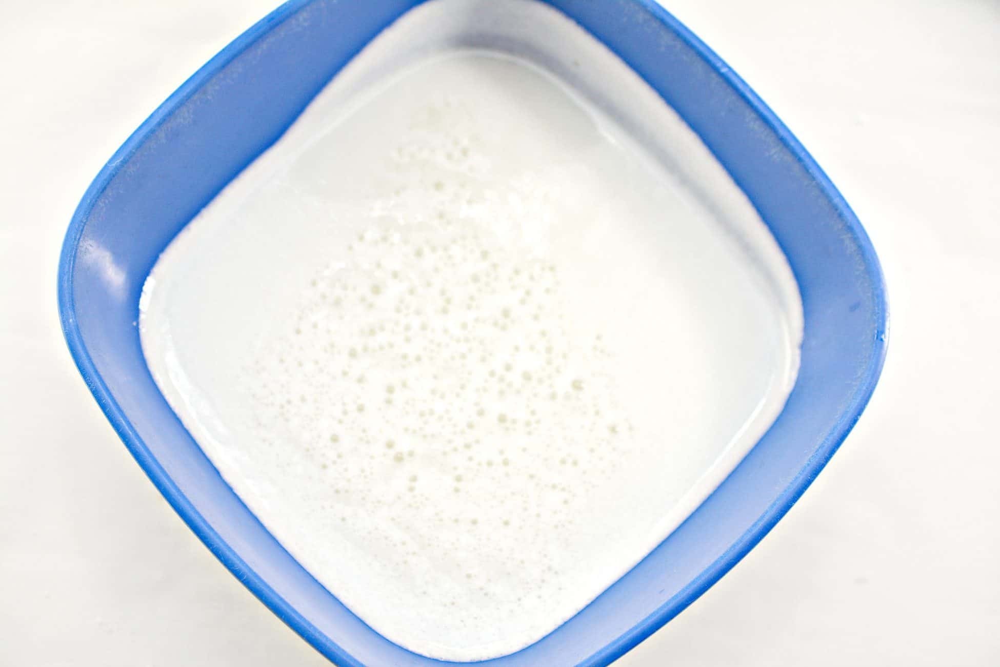 While the cake is baking, add the ingredients for the glaze to a mixing bowl, and beat until smooth and creamy.