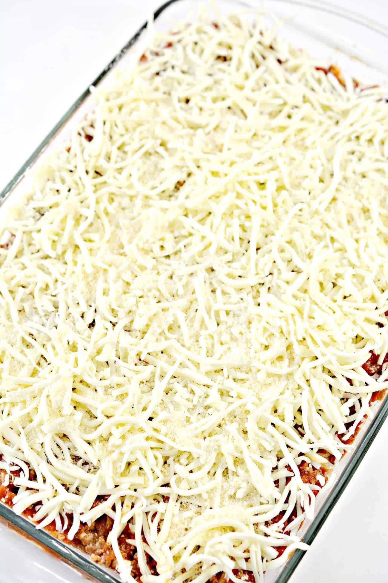 Sprinkle the mozzarella cheese and parmesan on top.
