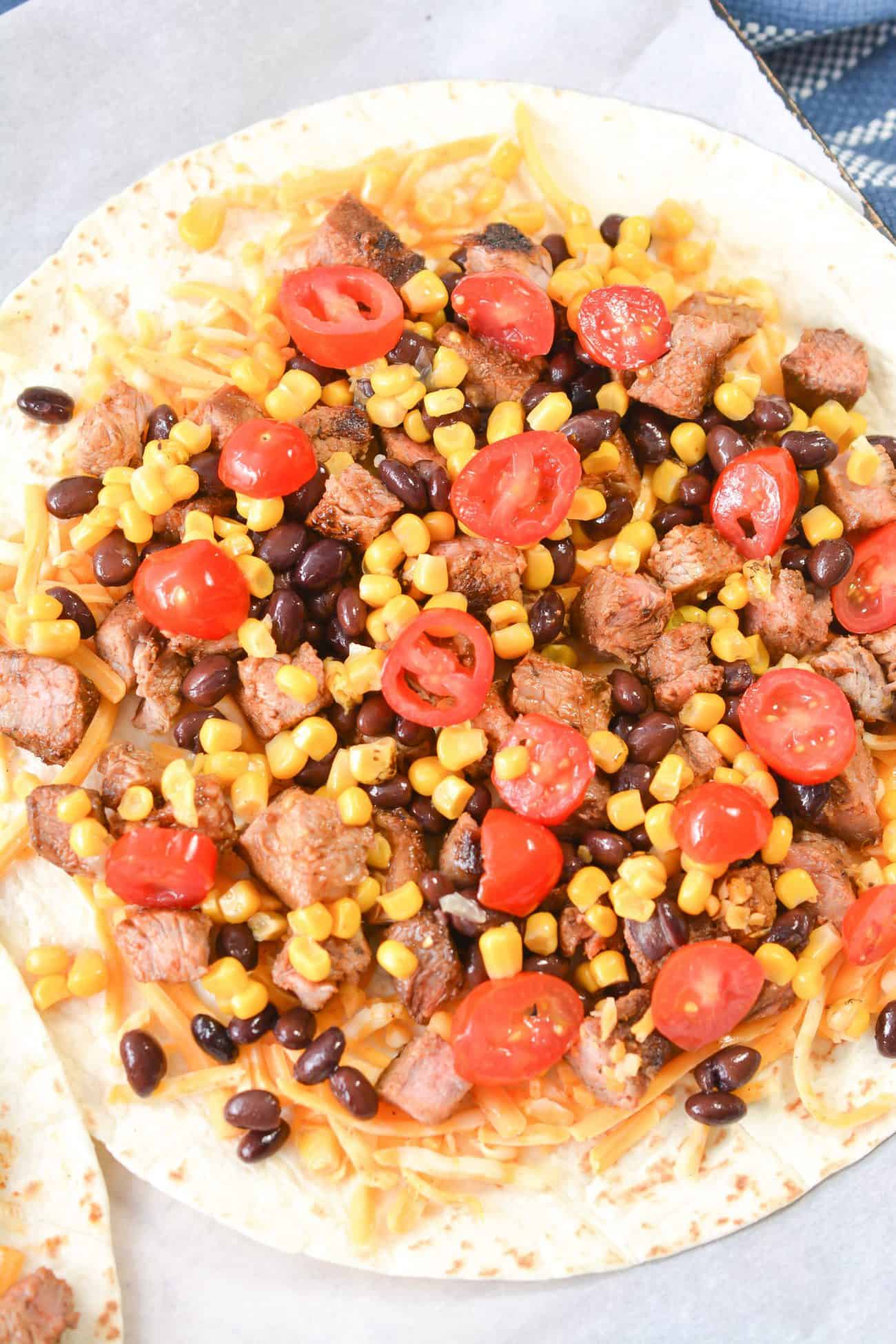 add ½ cup of fire-roasted corn drained and ½ cup of cherry tomatoes sliced.