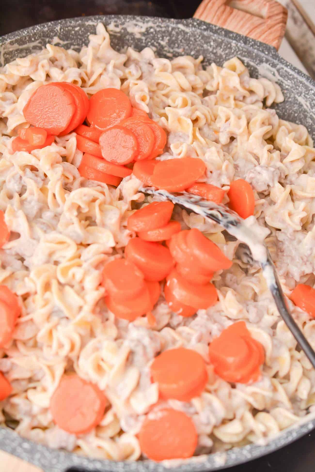 add 11 oz of can sliced carrots drained.