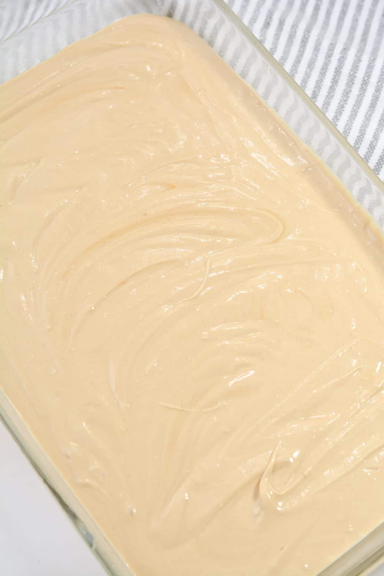 Pour the batter into a well-greased 9x13 baking dish.