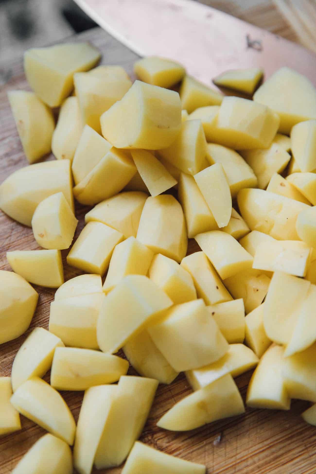 Slice your peeled potatoes into thin cuts.