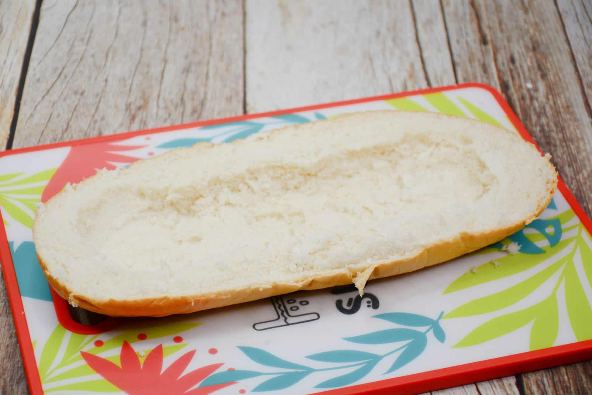 Place french loaf bread onto the cookie sheet.