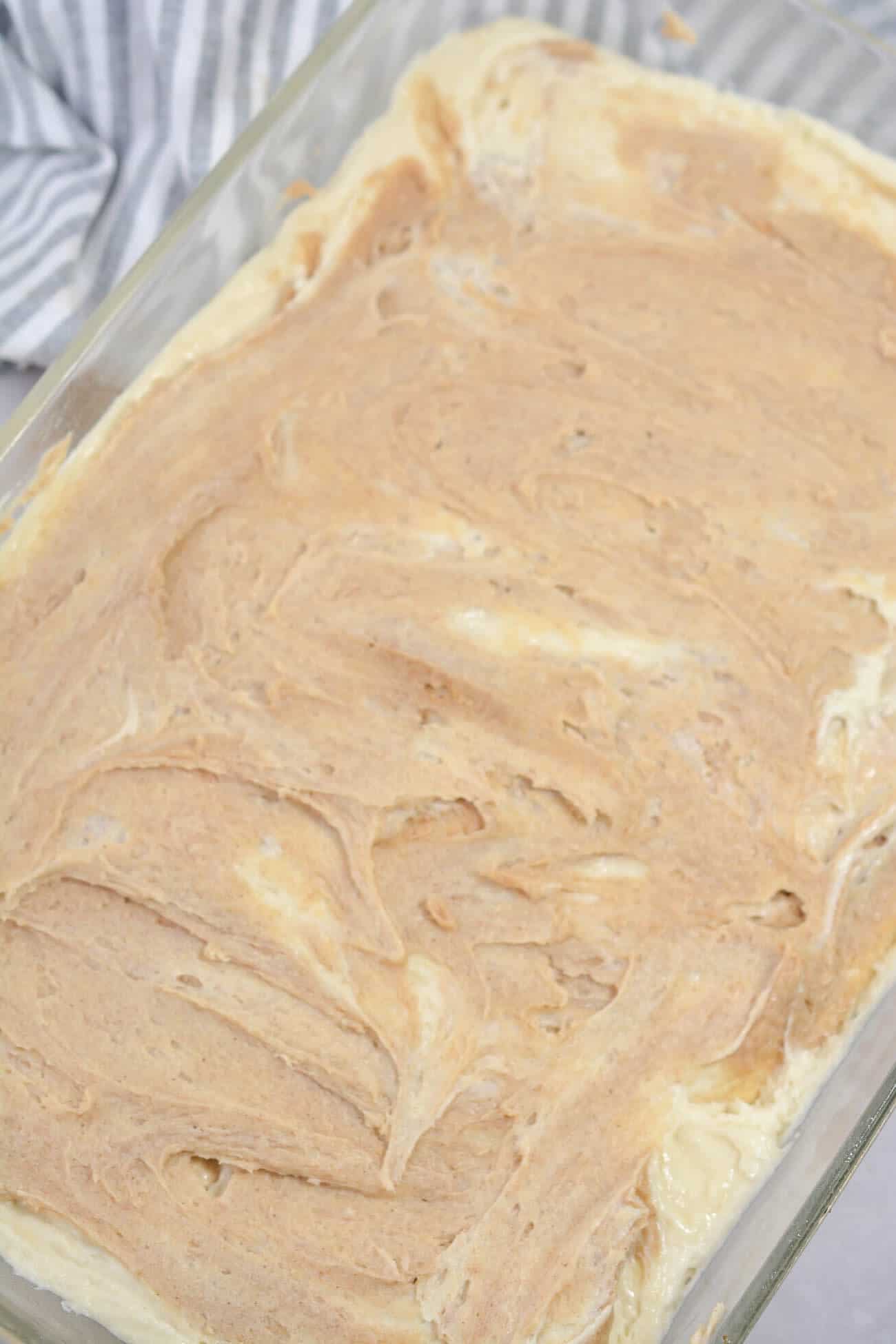 Spread the topping over the cake batter, and swirl to combine. 