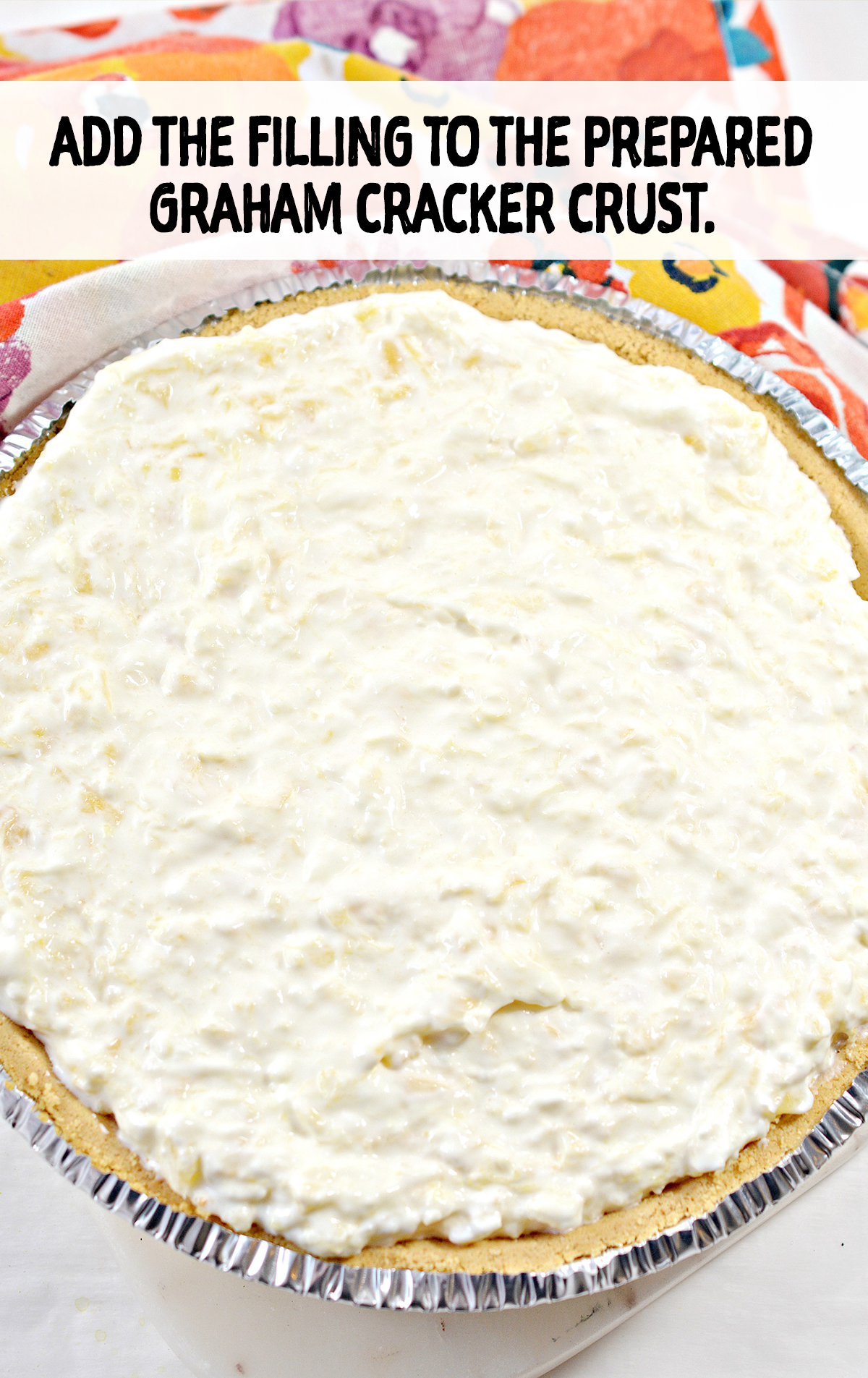 Add the filling to the prepared graham cracker crust, and place it into the fridge or freezer to chill until set.