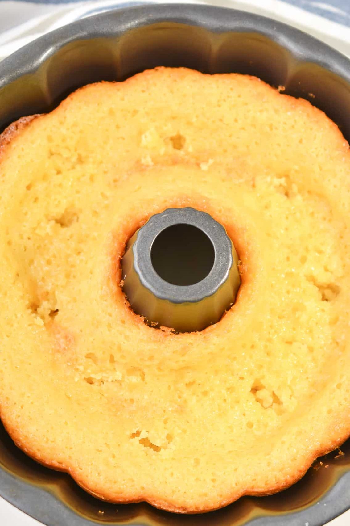 use the end of a butter knife to poke holes in the cake.