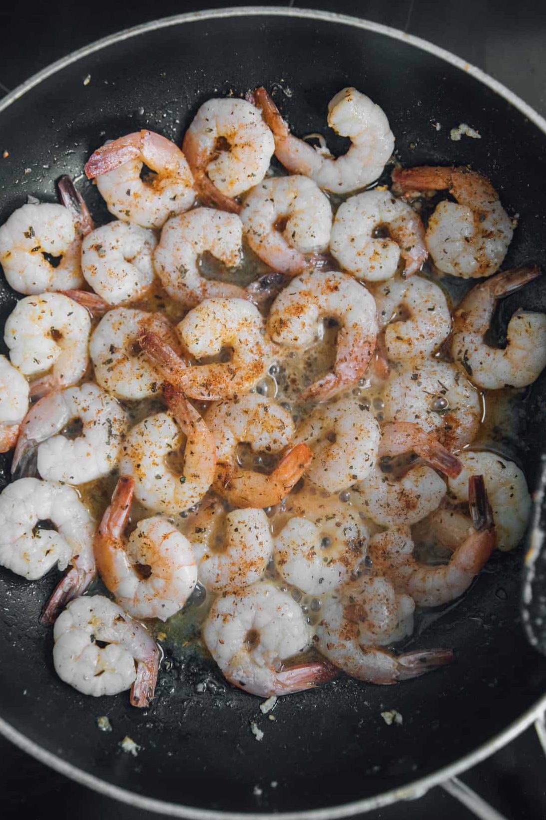season the shrimps with the Cajun seasoning., be generous (to your liking)!