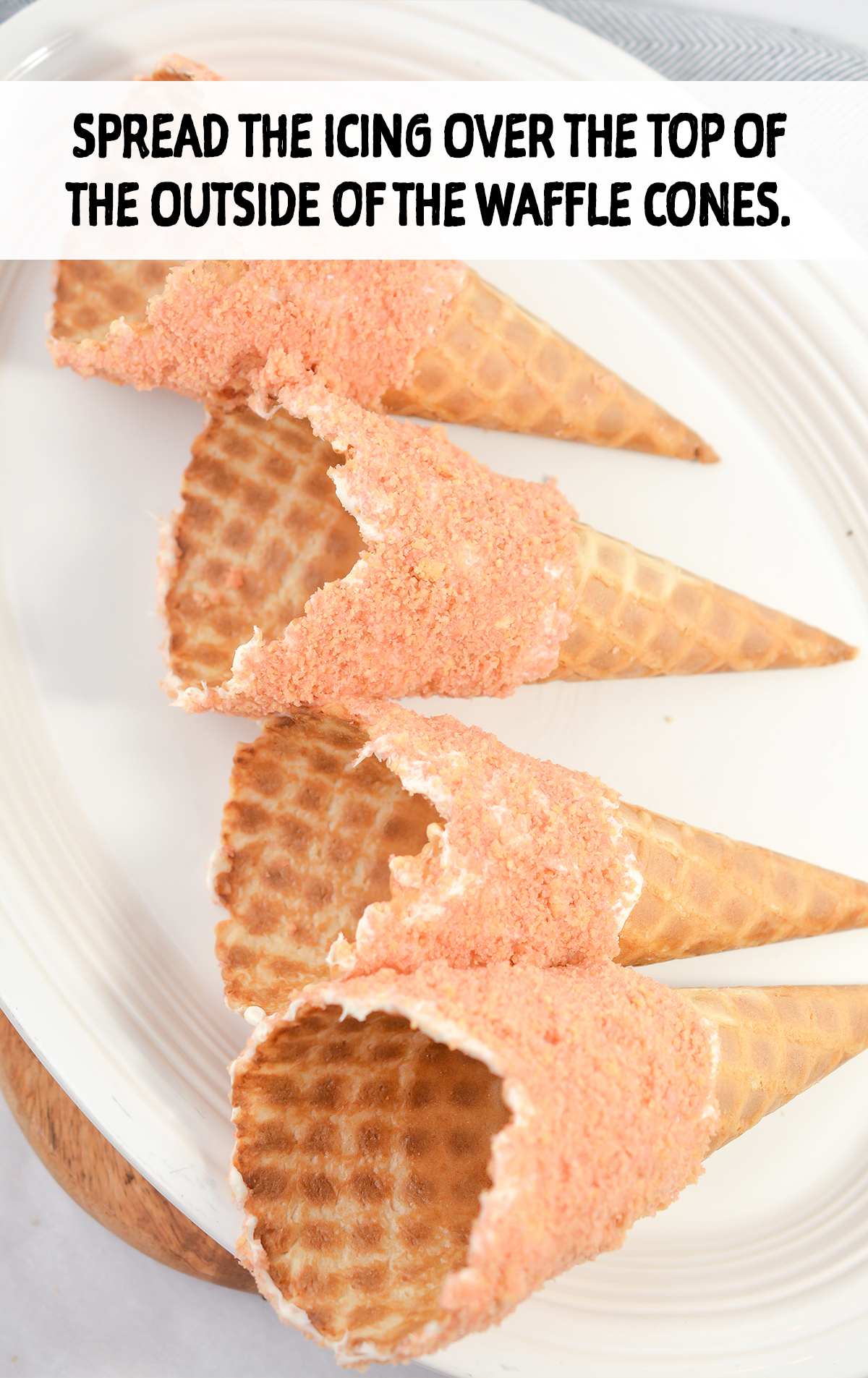 Spread the icing over the top of the outside of the waffle cones, going about halfway down the cone