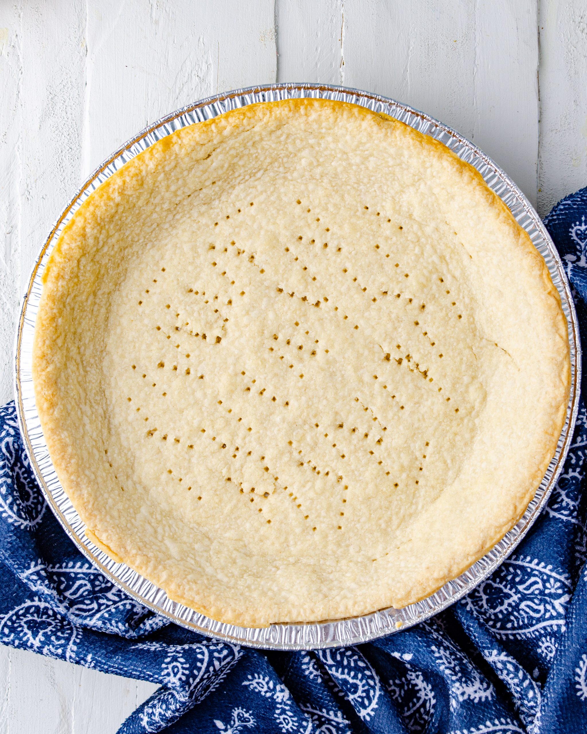 Bake frozen pie crust according to the directions on the package. Remove from oven and allow to cool for 30 minutes.