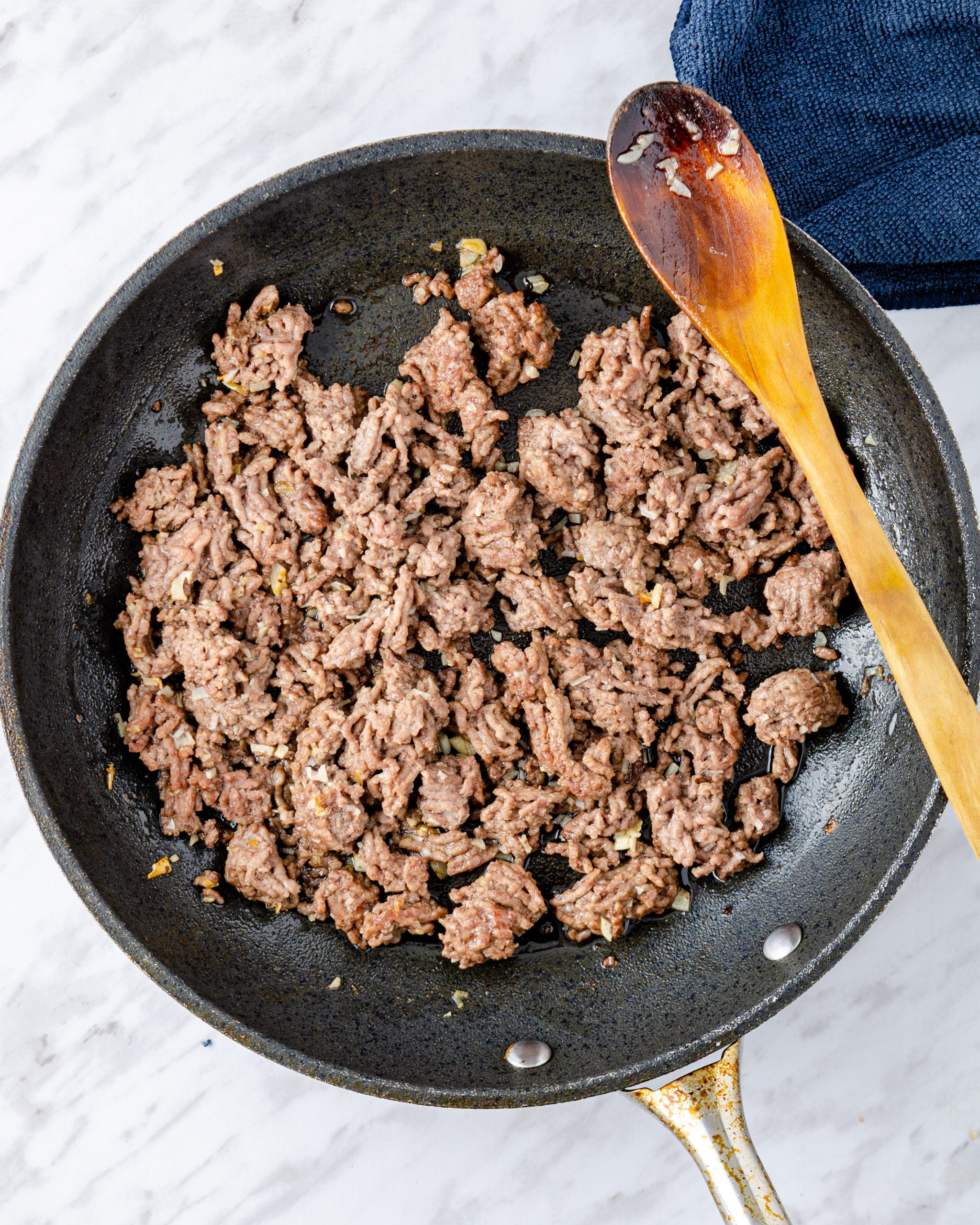 Stir-fry until beef is evenly browned for 5-7 minutes, drain excess fat.