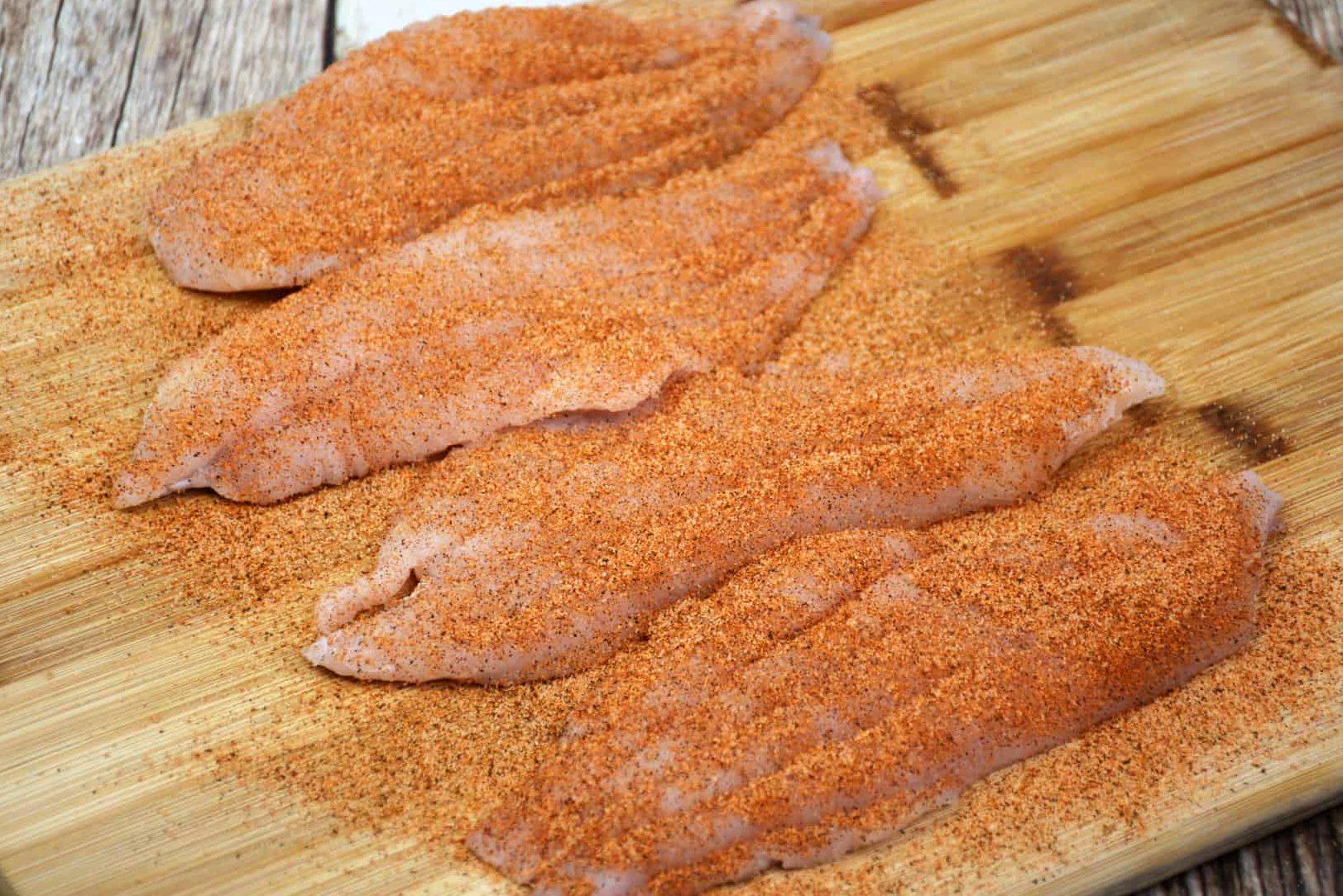 Brush 1 tbsp. Melted butter onto the fish and then evenly sprinkle the cajun spice on all sides of the fish.