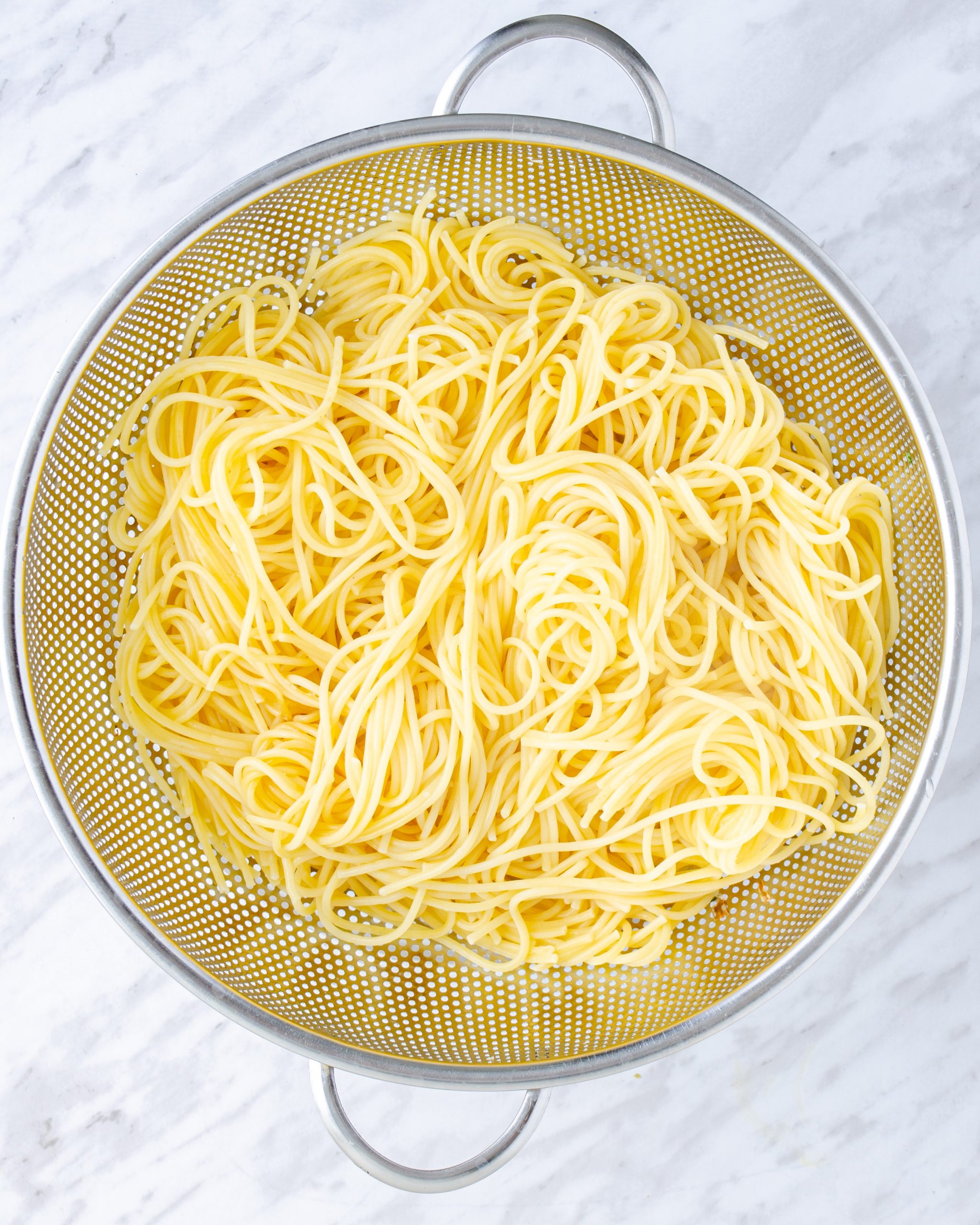 Cook the spaghetti to your liking, rinse under cold water, and drain well.